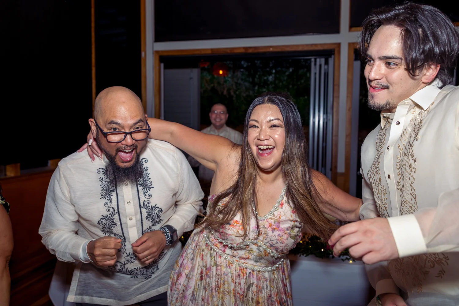 Guests dance and laugh together