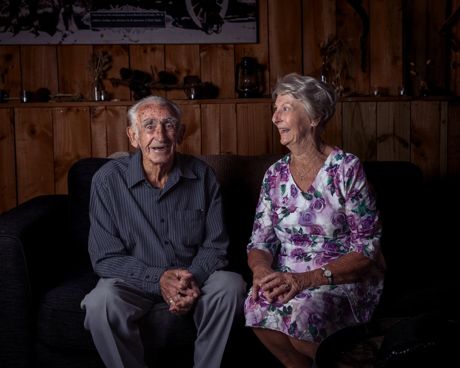 Two guests sit together for an evening portrait
