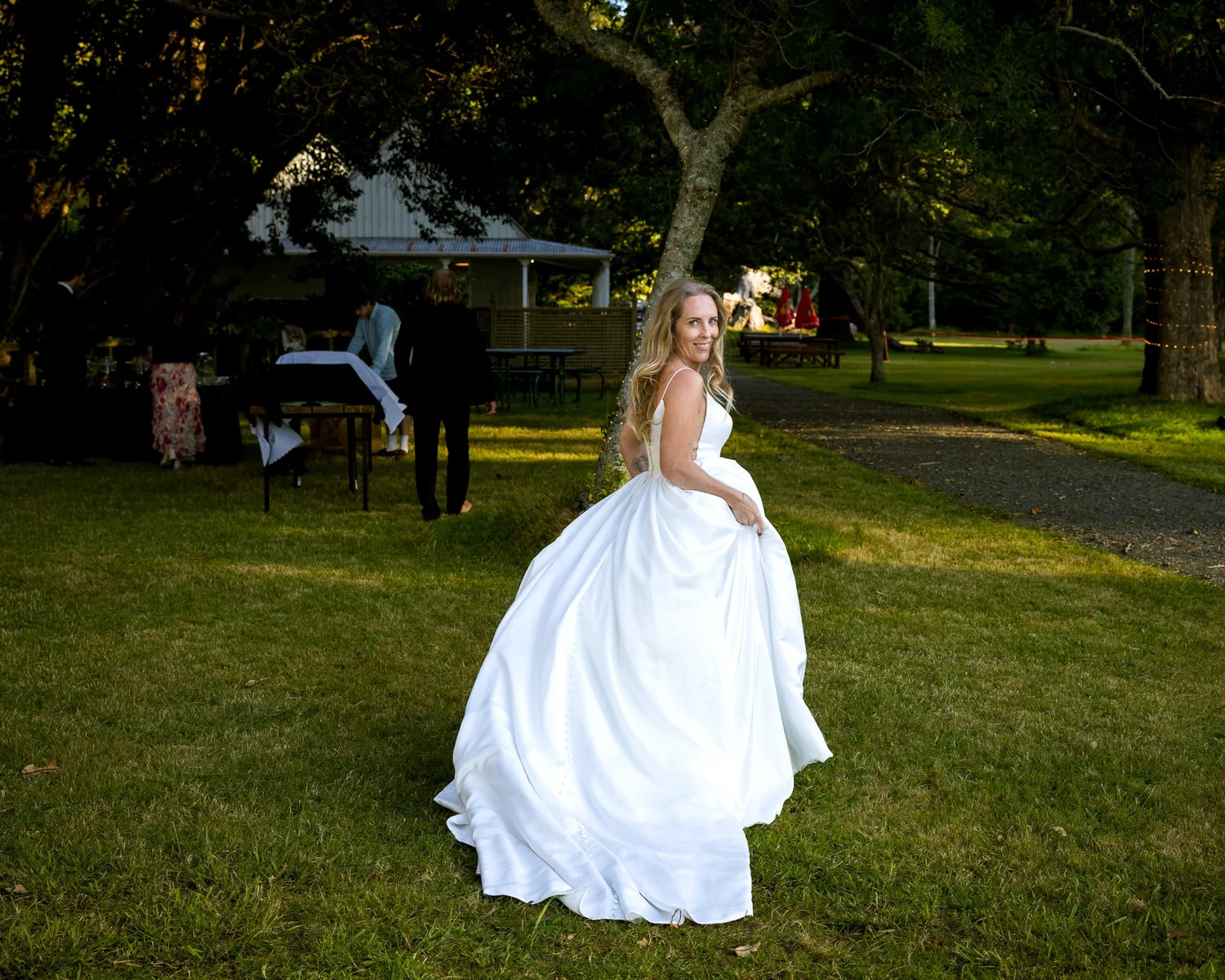 Chanel twirls on the lawn at Mansion House in evening light