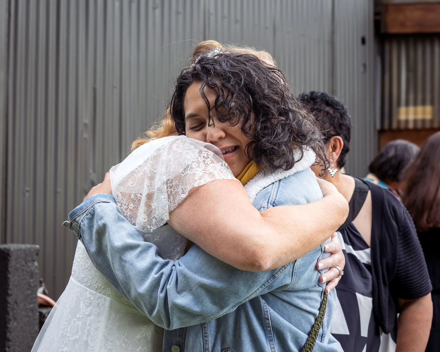 Julia hugs a guest after the ceremony