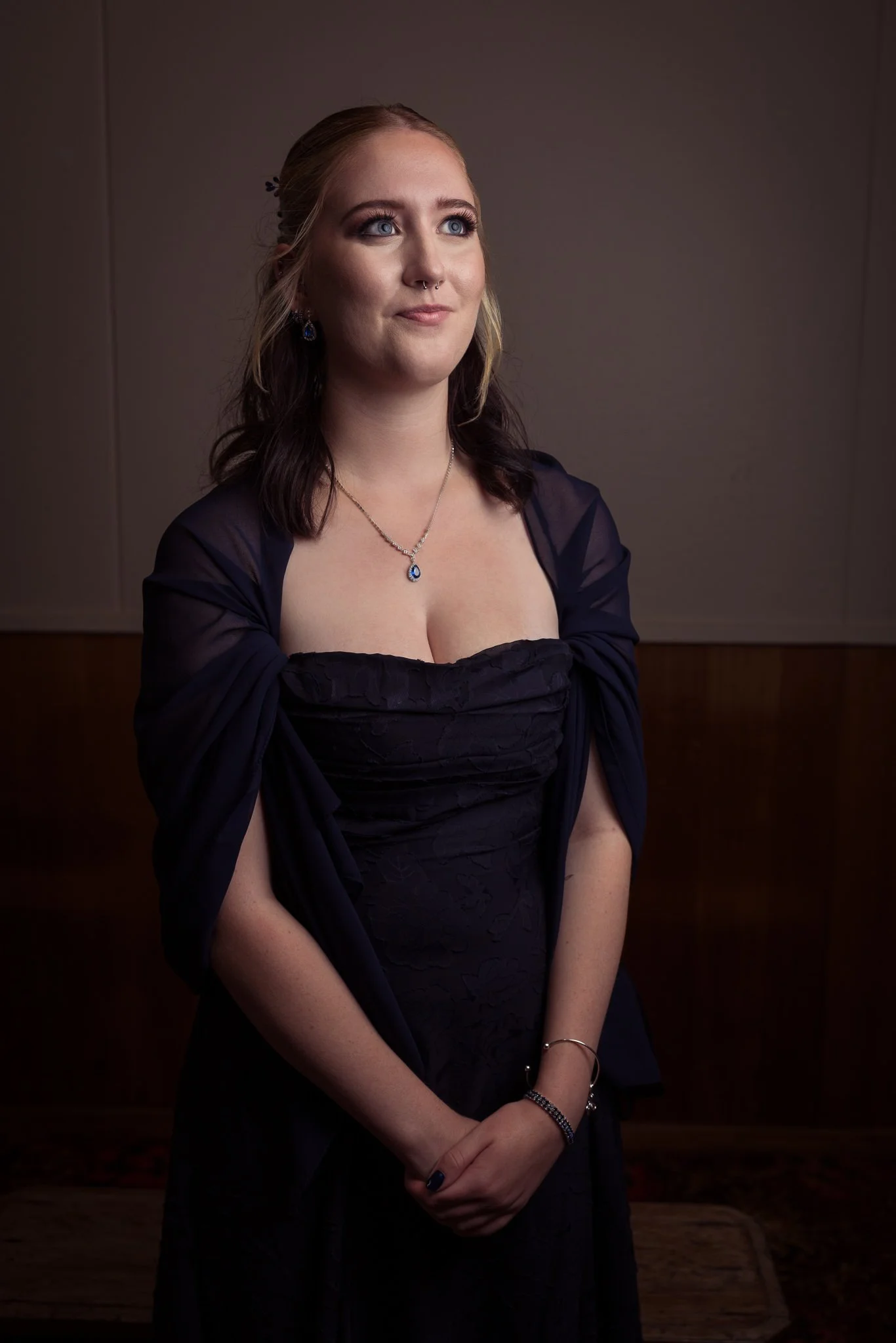 A guest in a dark dress for an evening portrait