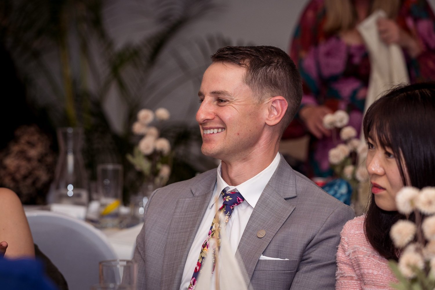 A guest smiles during the reception