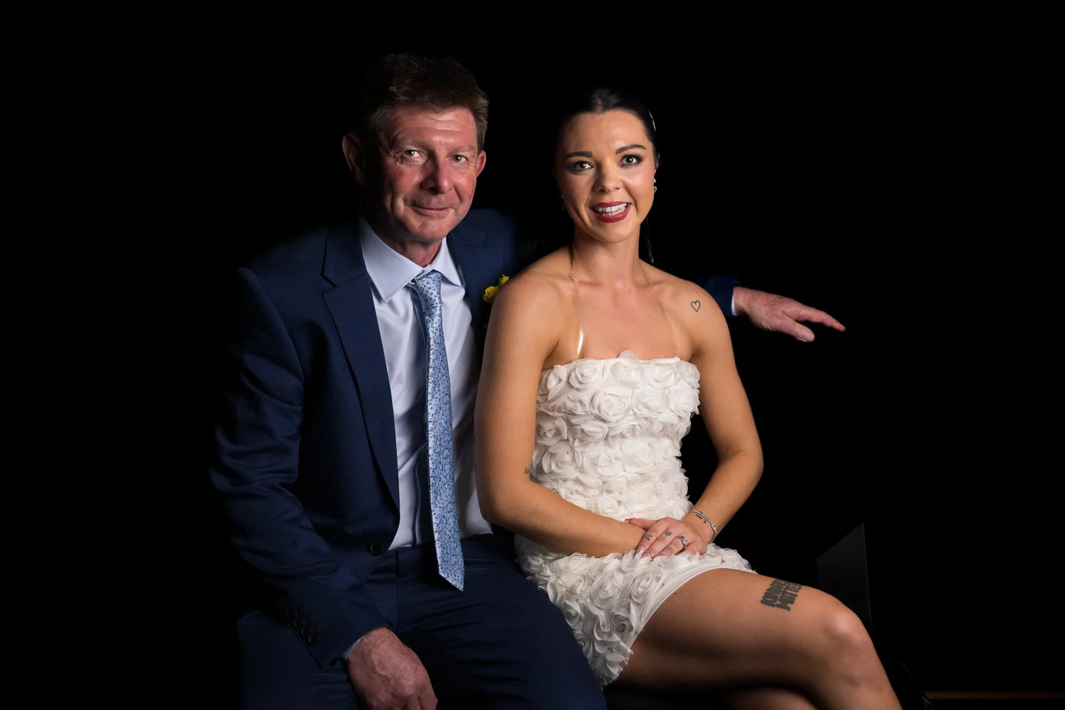 Emma poses with a guest for an evening portrait