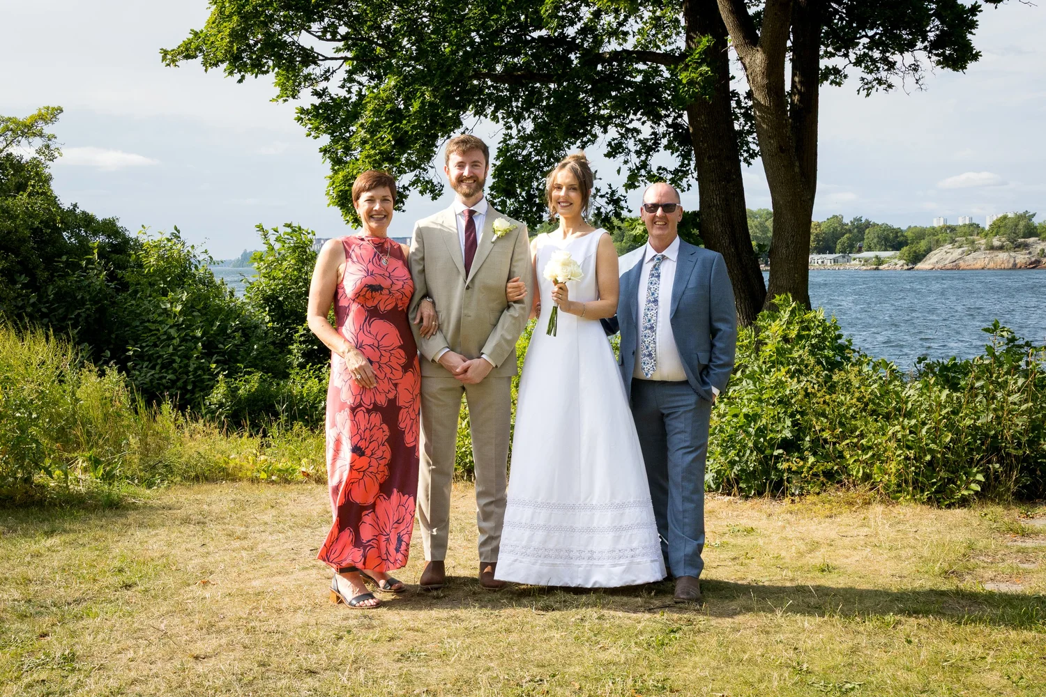Sofia and John with family on the shore
