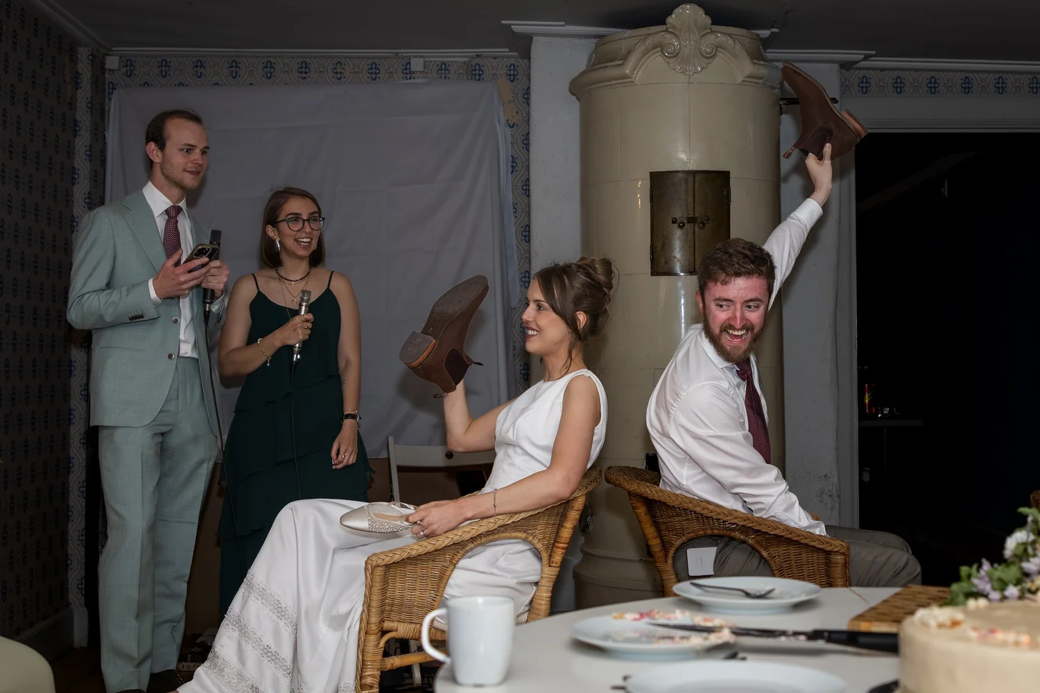 Guests celebrate around the table in the evening