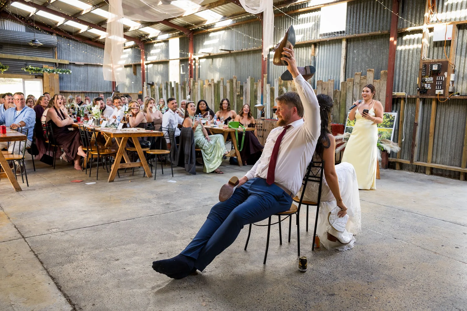 A guest leans back in his chair during the speeches