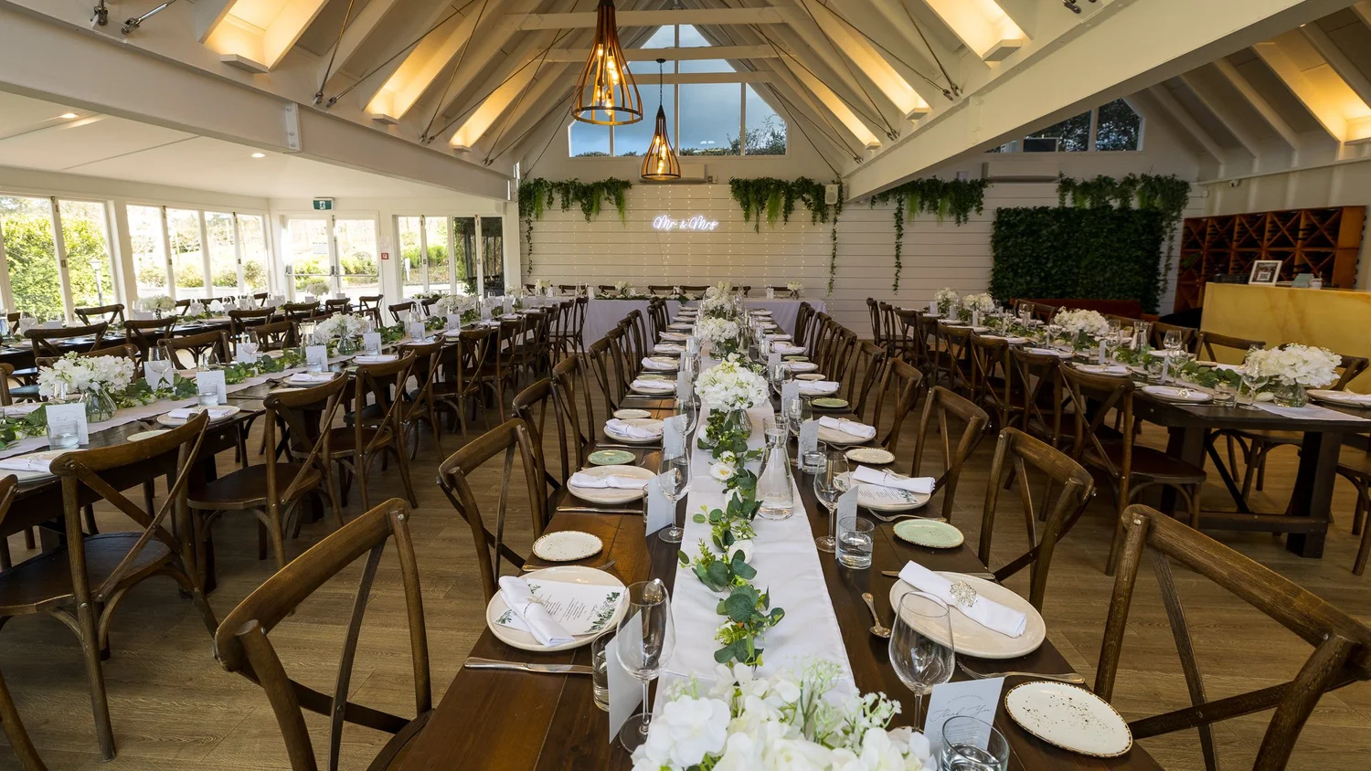 The reception hall at Abel Estate set with long tables