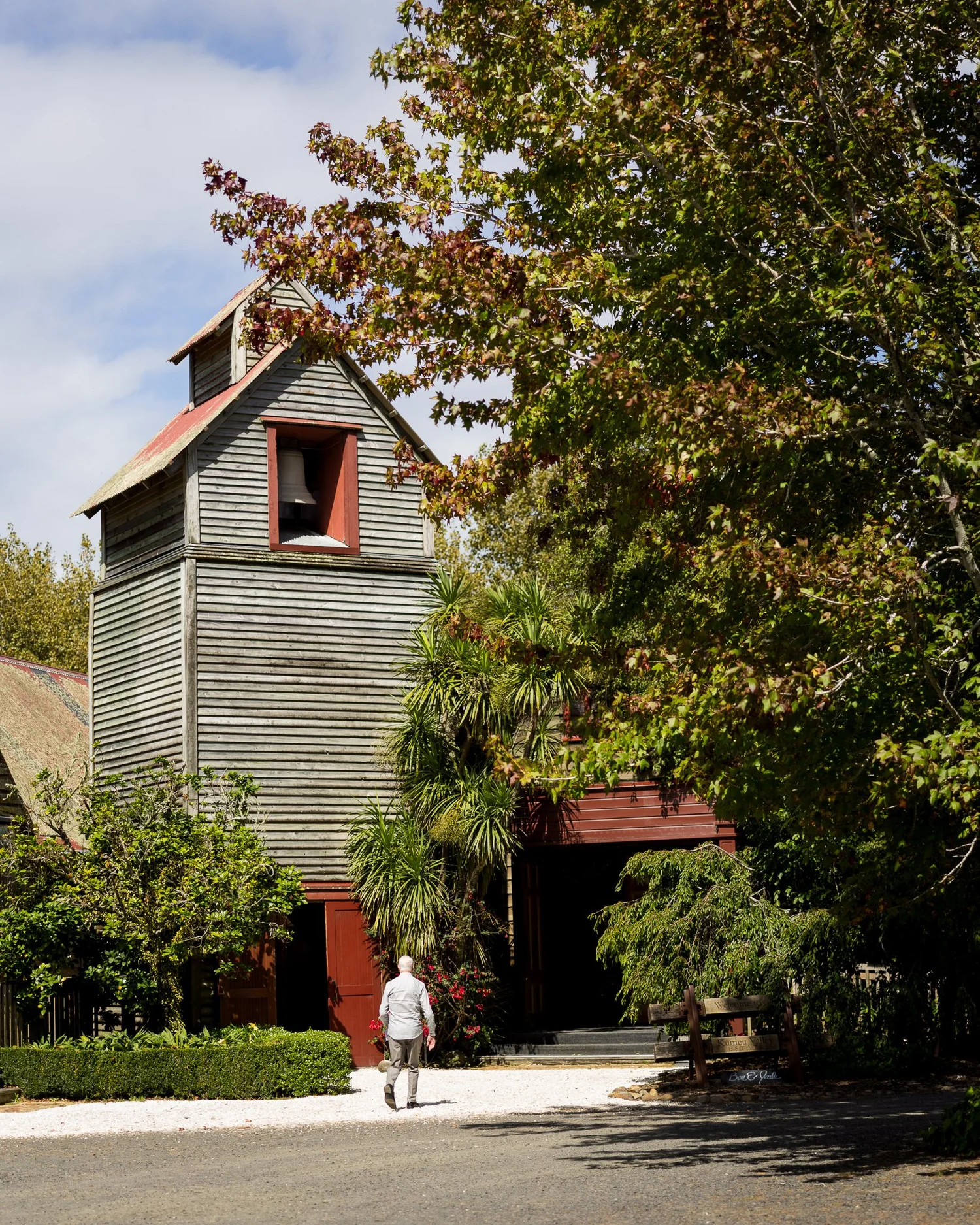 The historic timber tower among the trees at Kumeu Valley Estate