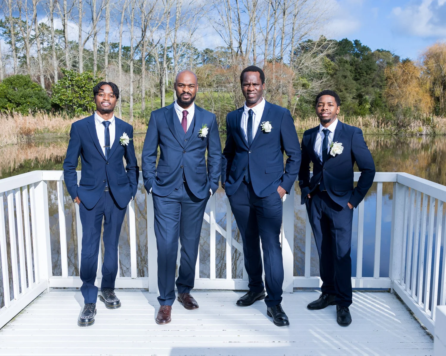 Foster and his groomsmen on the lakeside rotunda
