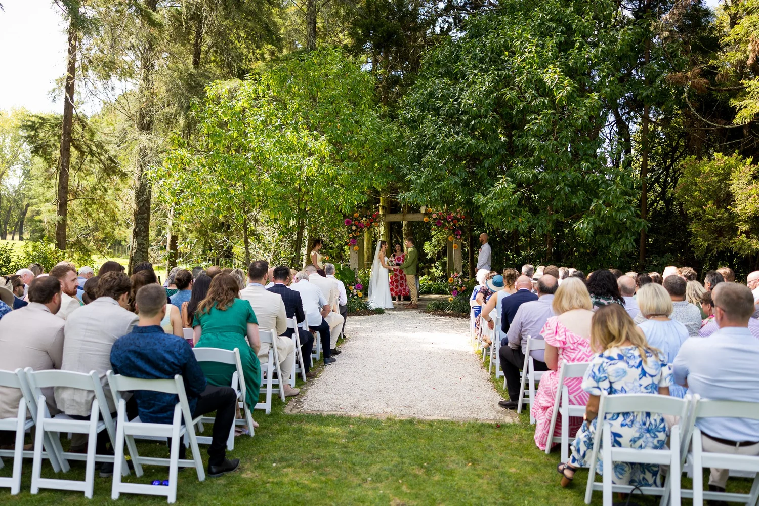 Guests seated for the garden ceremony at Kumeu Valley Estate