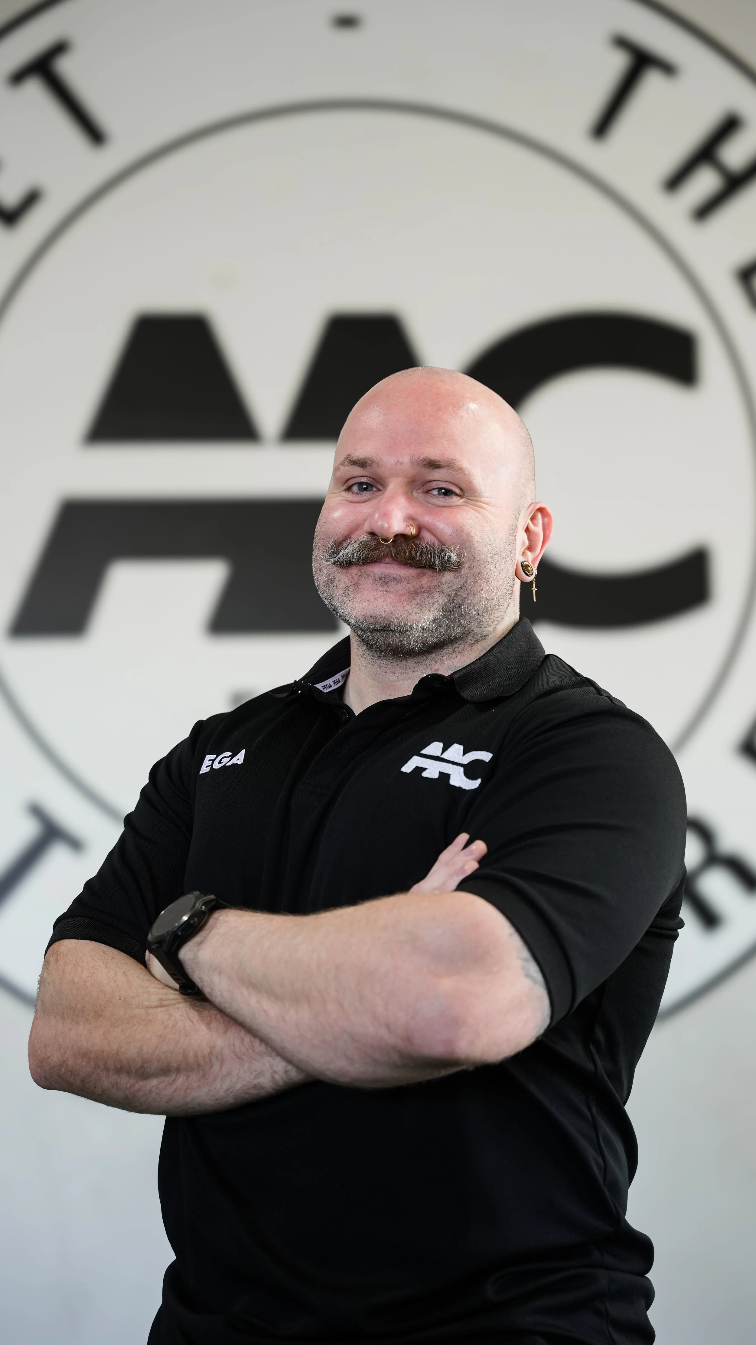 Physiotherapy session with strength athlete in Adelaide gym