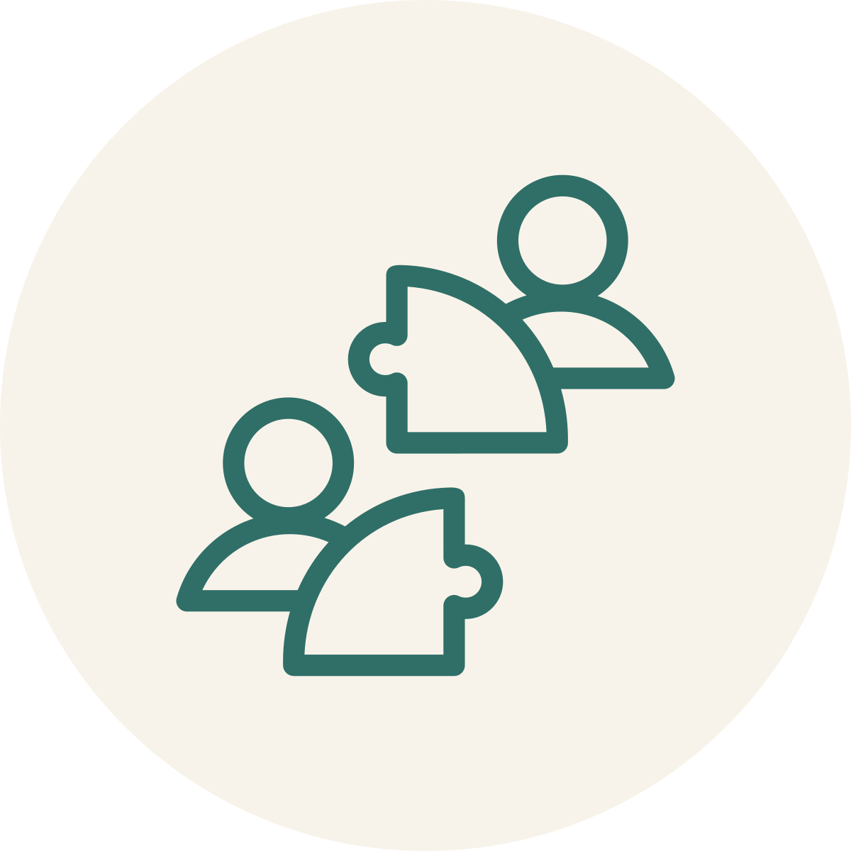 Icon of two people with puzzle pieces connecting, representing collaboration or teamwork.