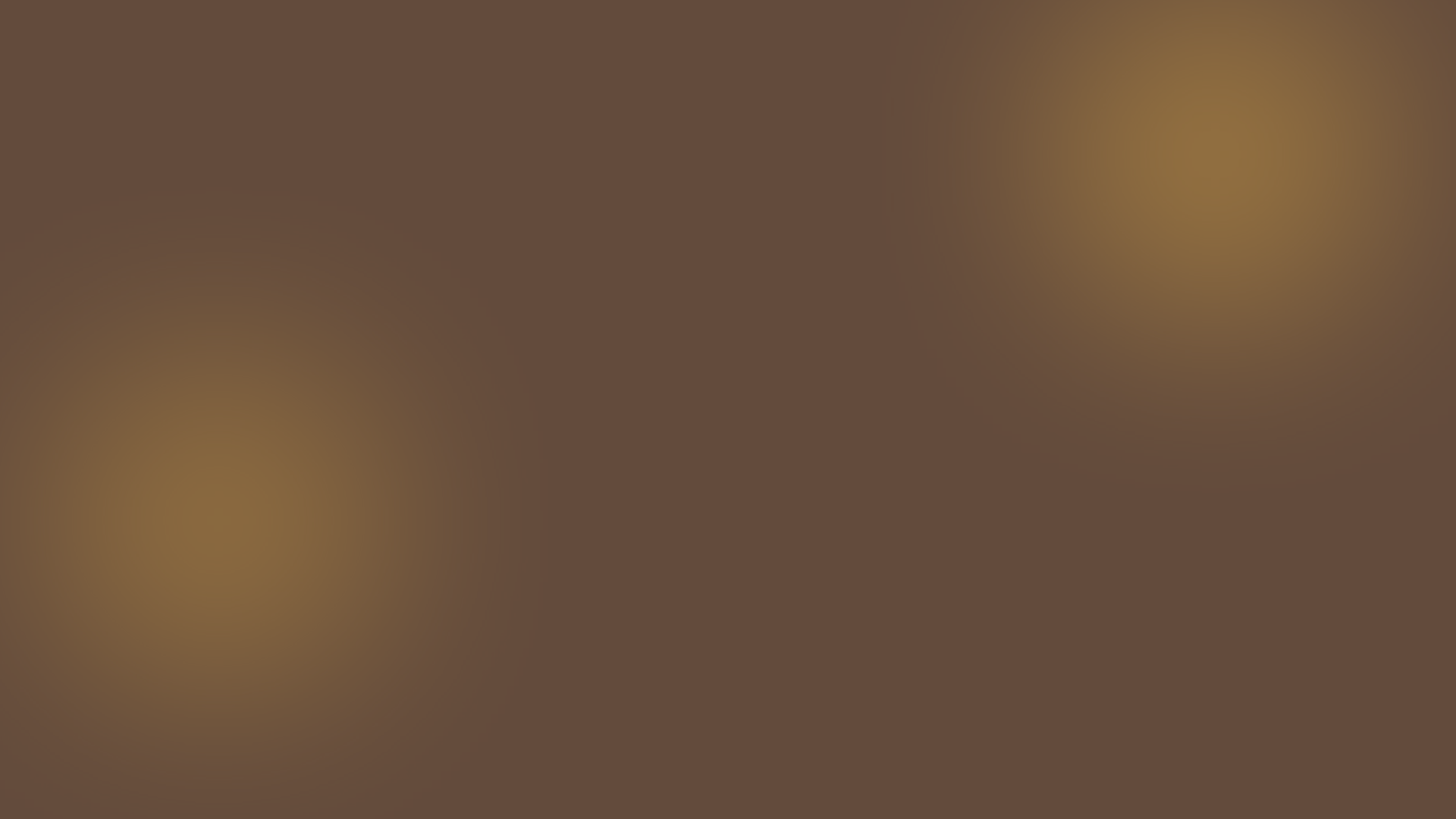 A blurred image with dark and yellowish-brown colors, no discernible objects.