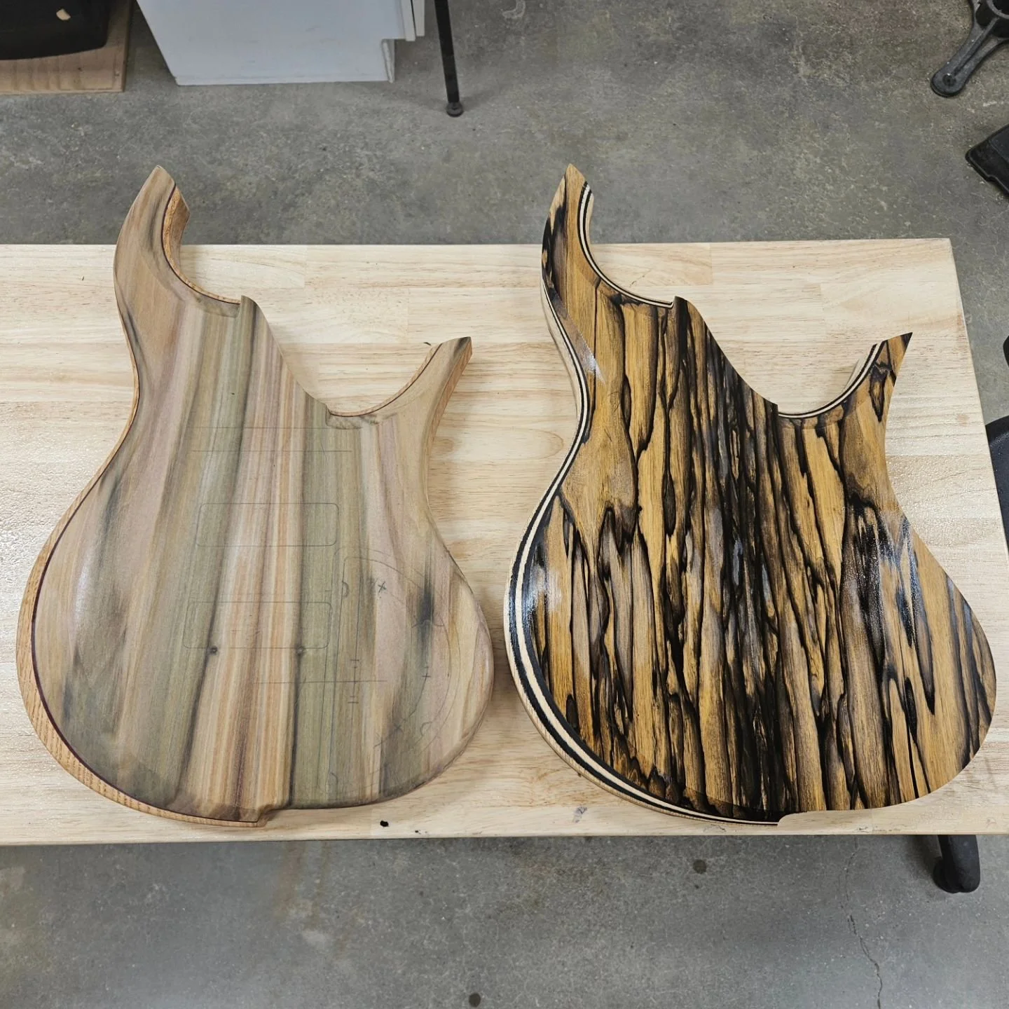 The Wood 🤯🤯! The next 2 Mammoth basses are coming along nicely. These bodies both got some upgrades from the walnut prototype with a rechargeable fishman 9volt compartment (the hole on the back) and push down continuous wood cover plates.
The palem