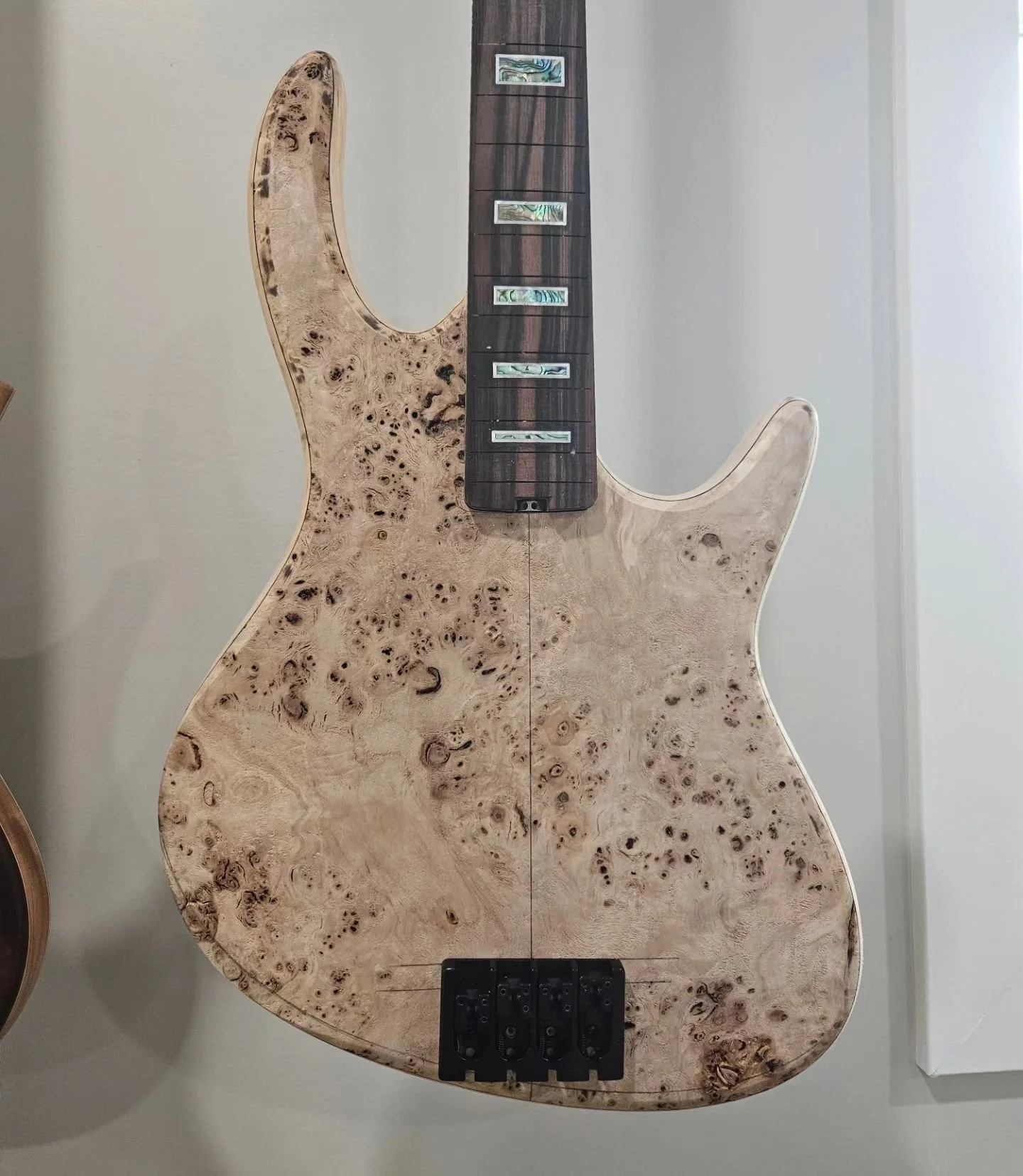 A new custom commission under way with a completely new design. It's not my usual style, but seeing it come together, I'll probably build a few more soon.

#grogguitars #luthier #luthiery #guitarmaker #customguitar #boutiqueguitars #customguitarbuild