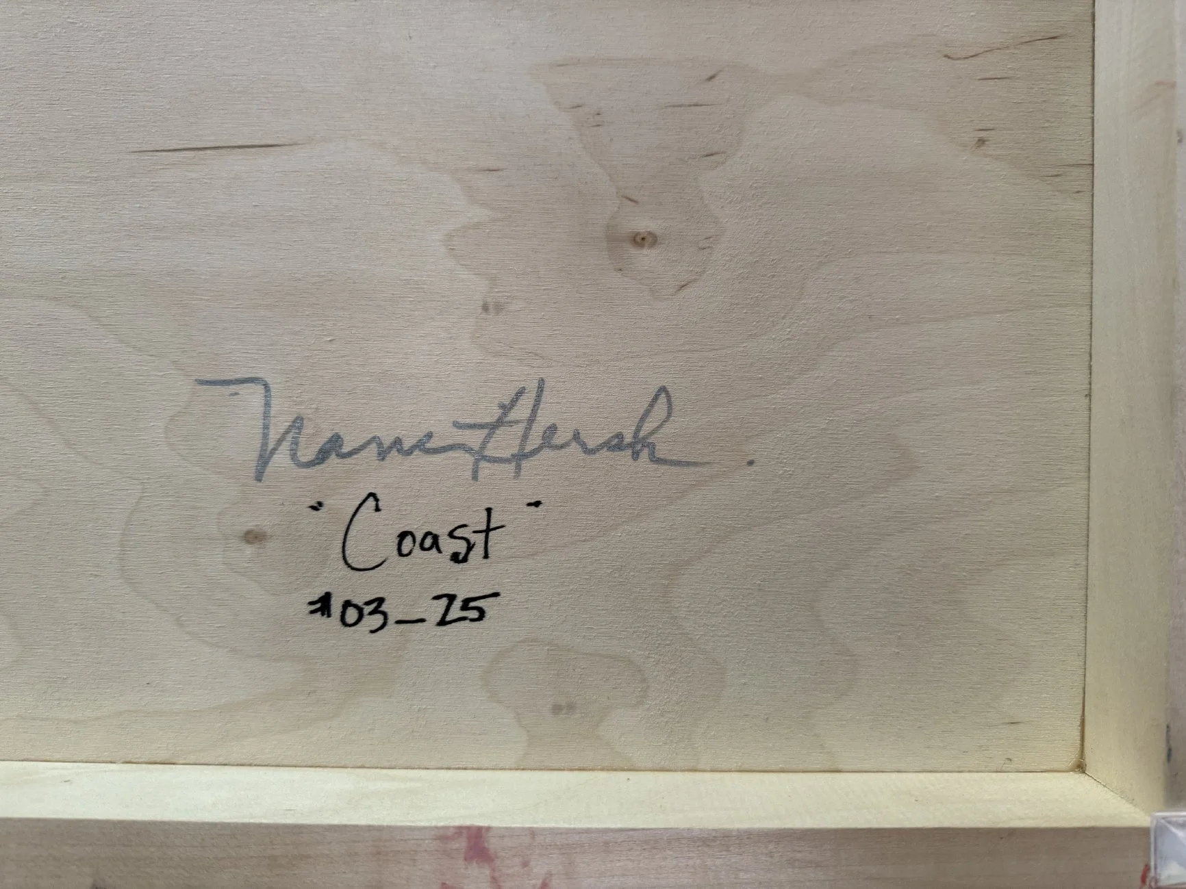 'Coast_signature on back.jpg