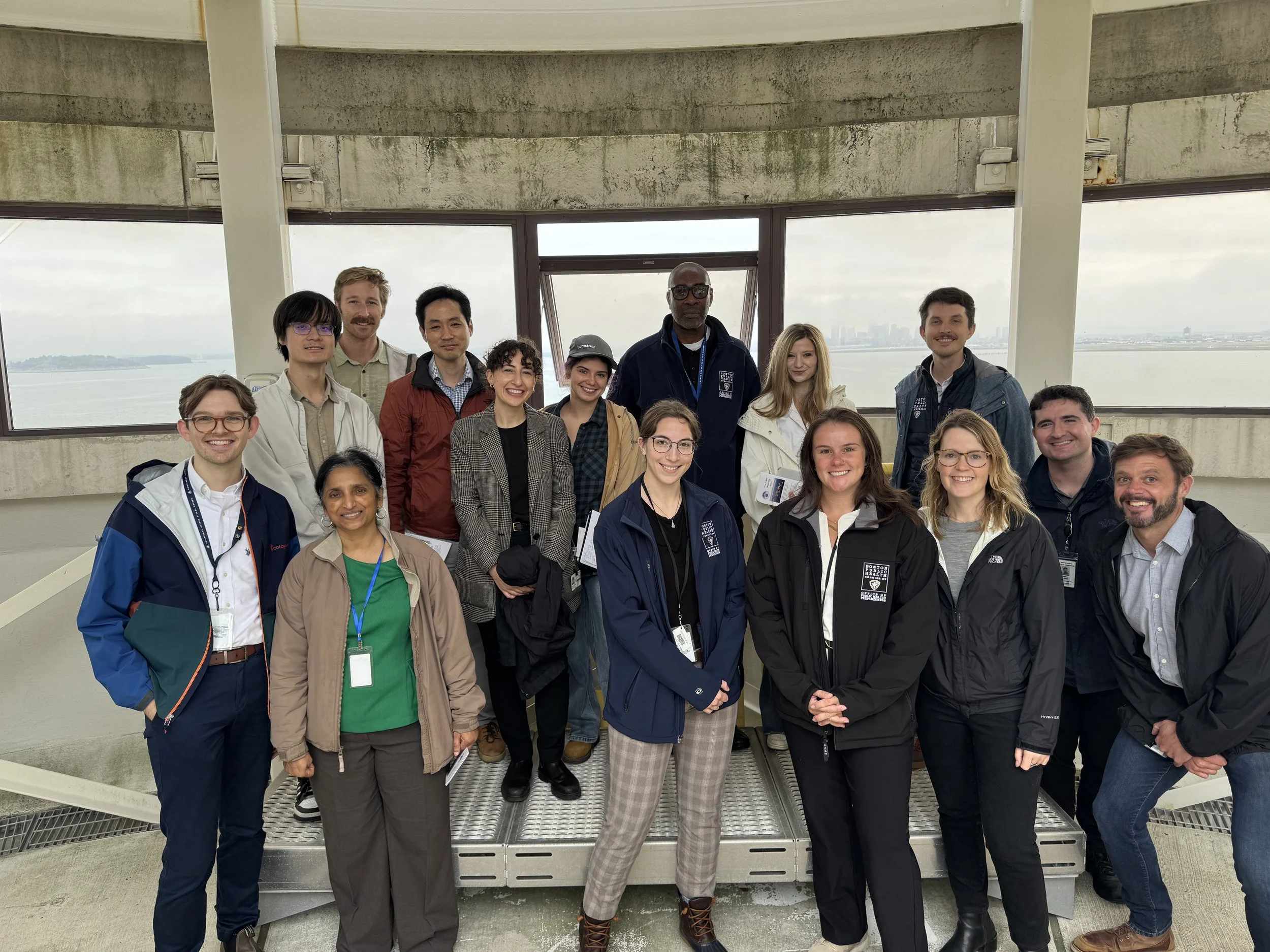 Members of the Healy Lab and Boston Public Health Commission took a tour of Boston's Deer Island Wastewater Treatment Facility in September 2025. Here, we're on top of one of the iconic egg-shaped bioreactors.