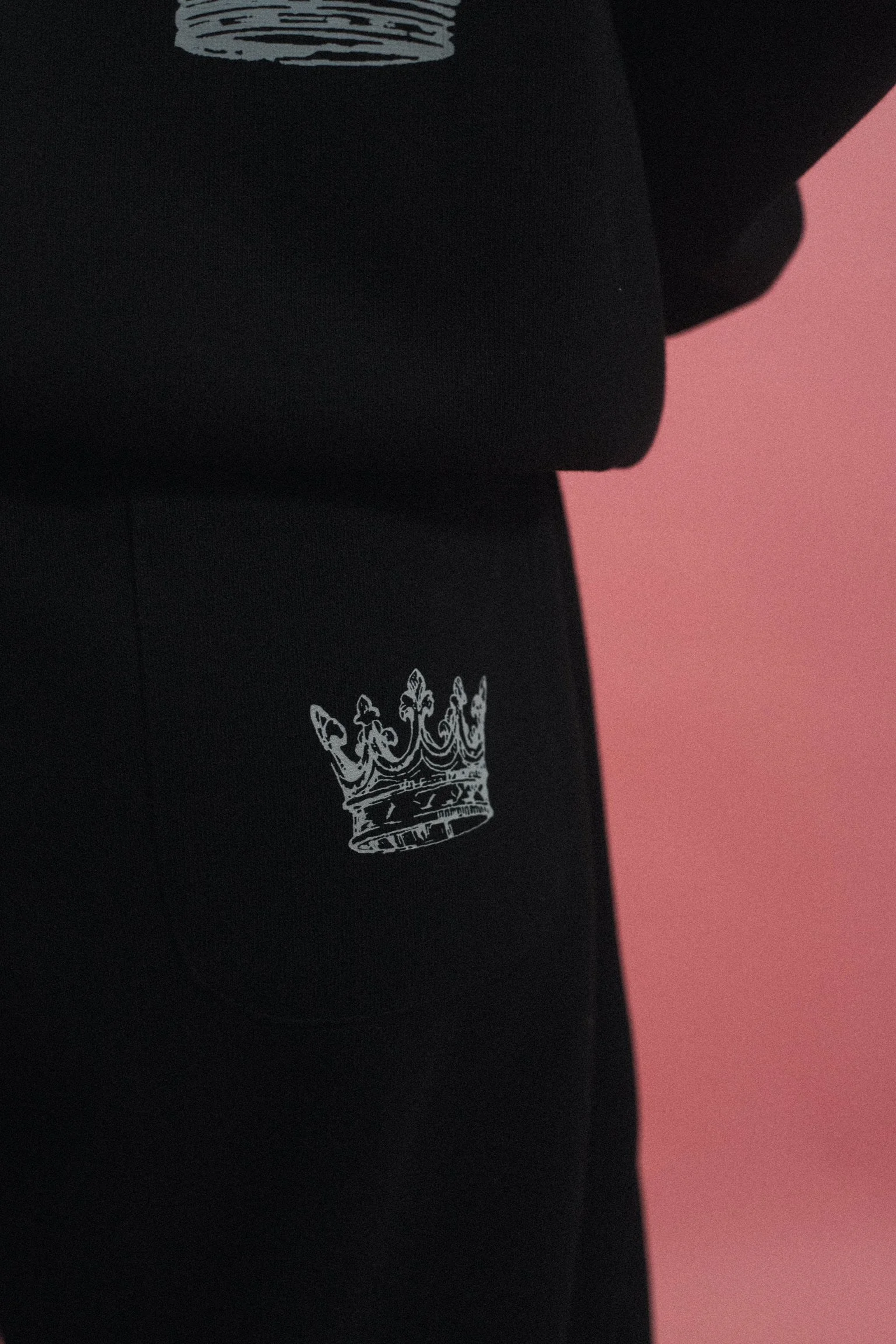 Model wearing the For The Crown Christian streetwear tracksuit by Emunah Yahweh