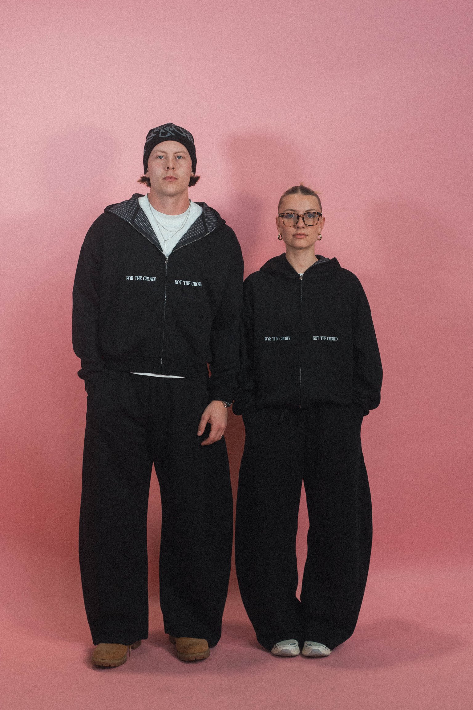 Model wearing the For The Crown Christian streetwear tracksuit by Emunah Yahweh