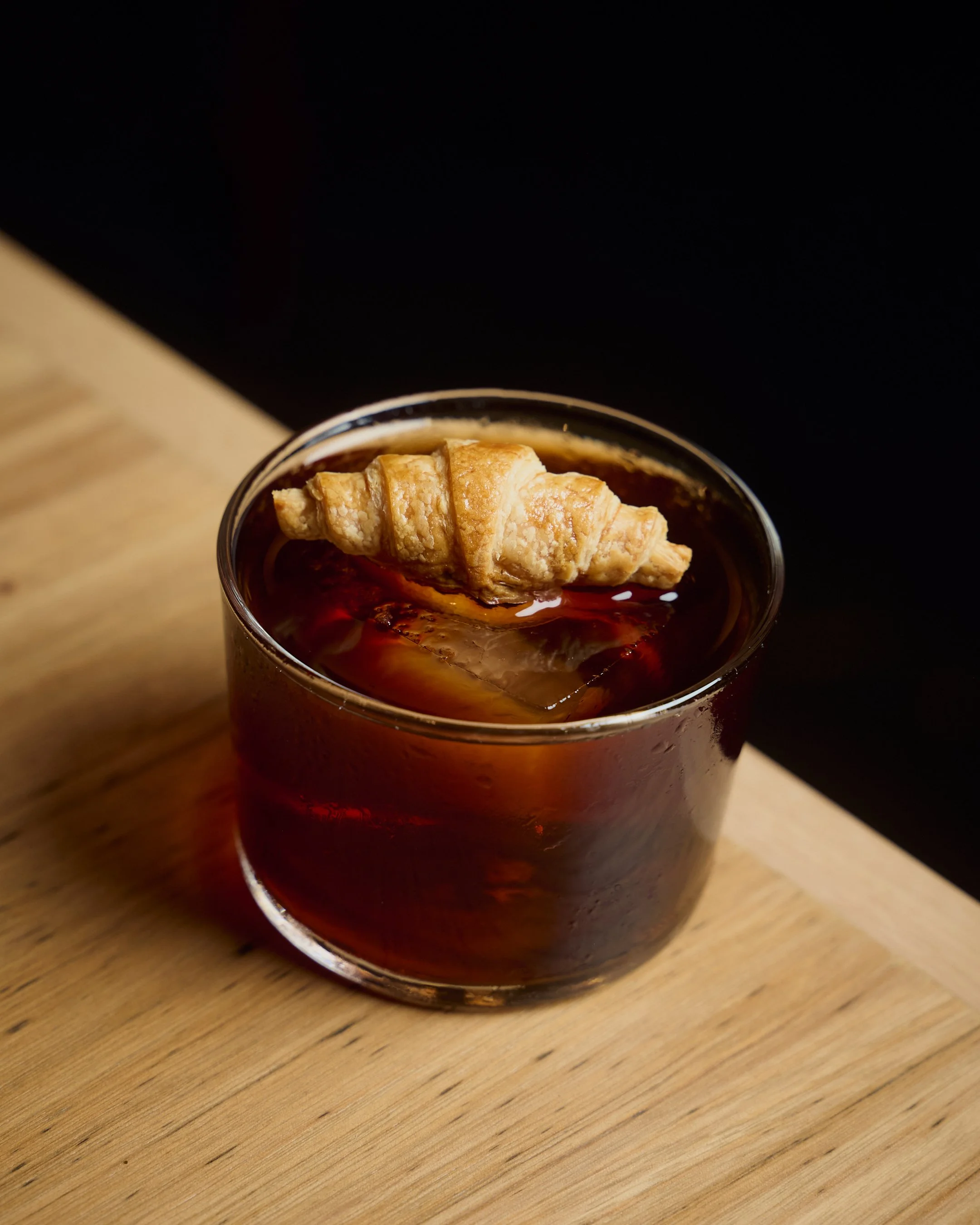 Cocktail at Babines with croissant garnish