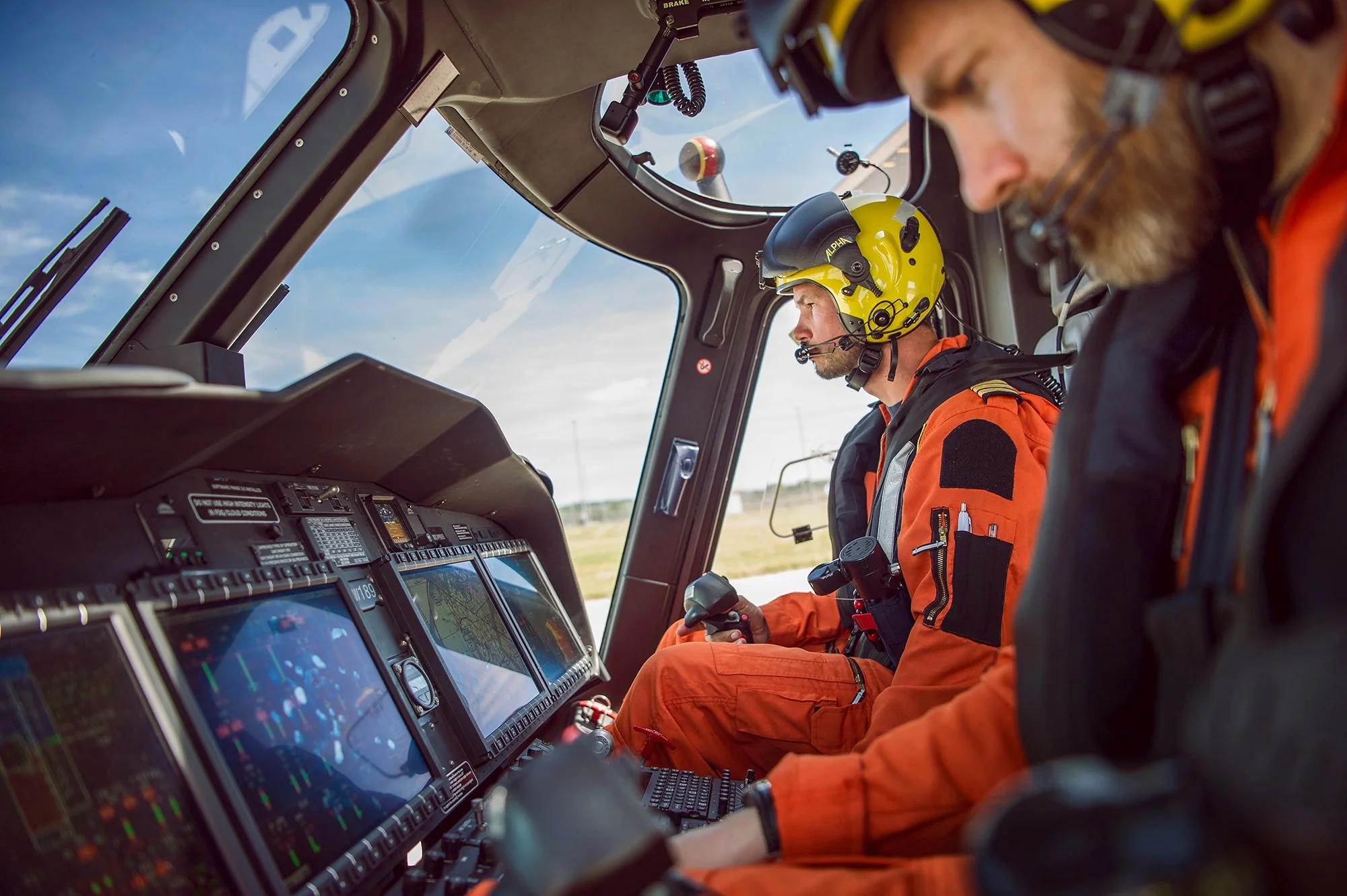 HM Coastguard Search and Rescue helicopter pilots preparing to take off.