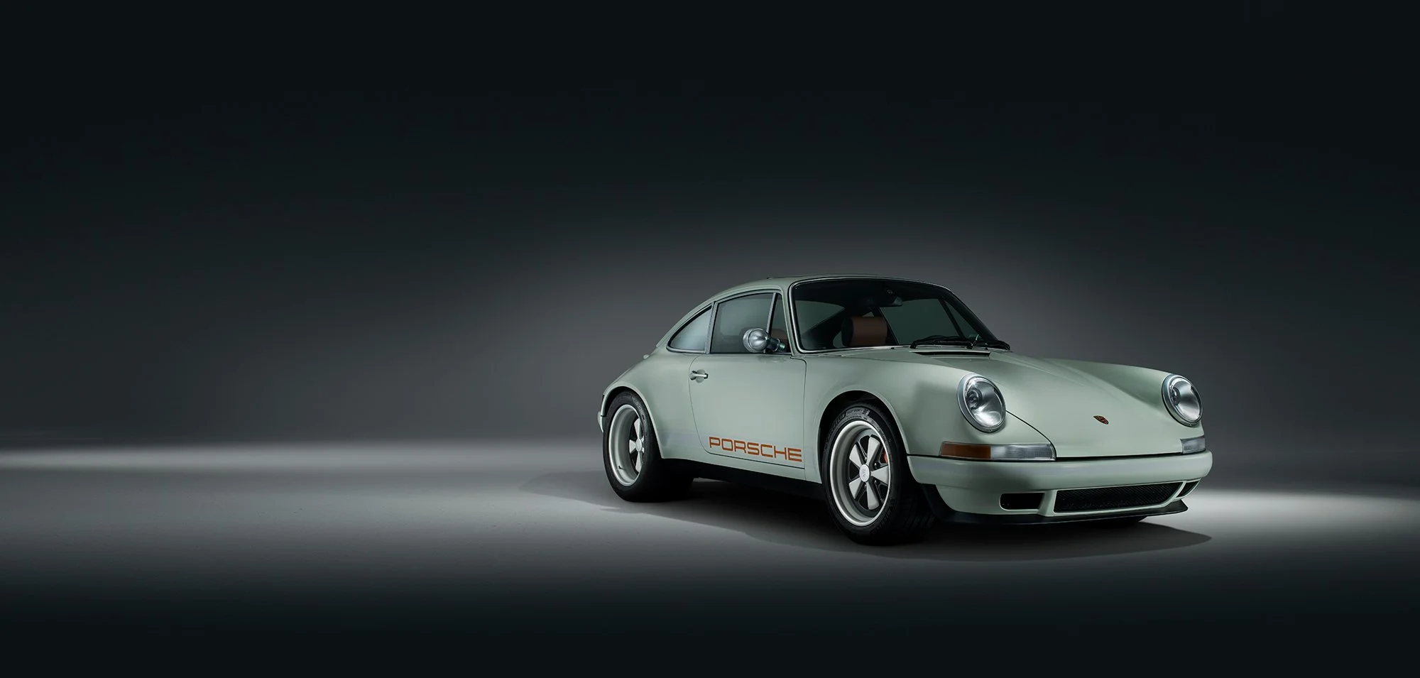 Porsche 911 photographed in studio by AmbientLife Photography.