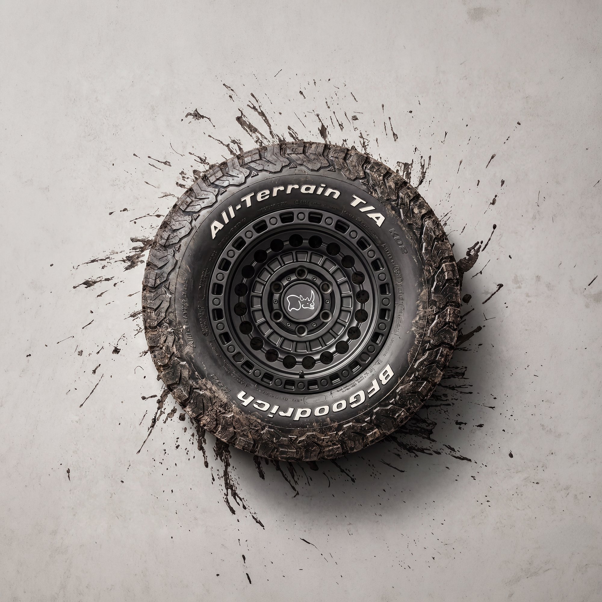 Off road tyre and wheel with muddy floor