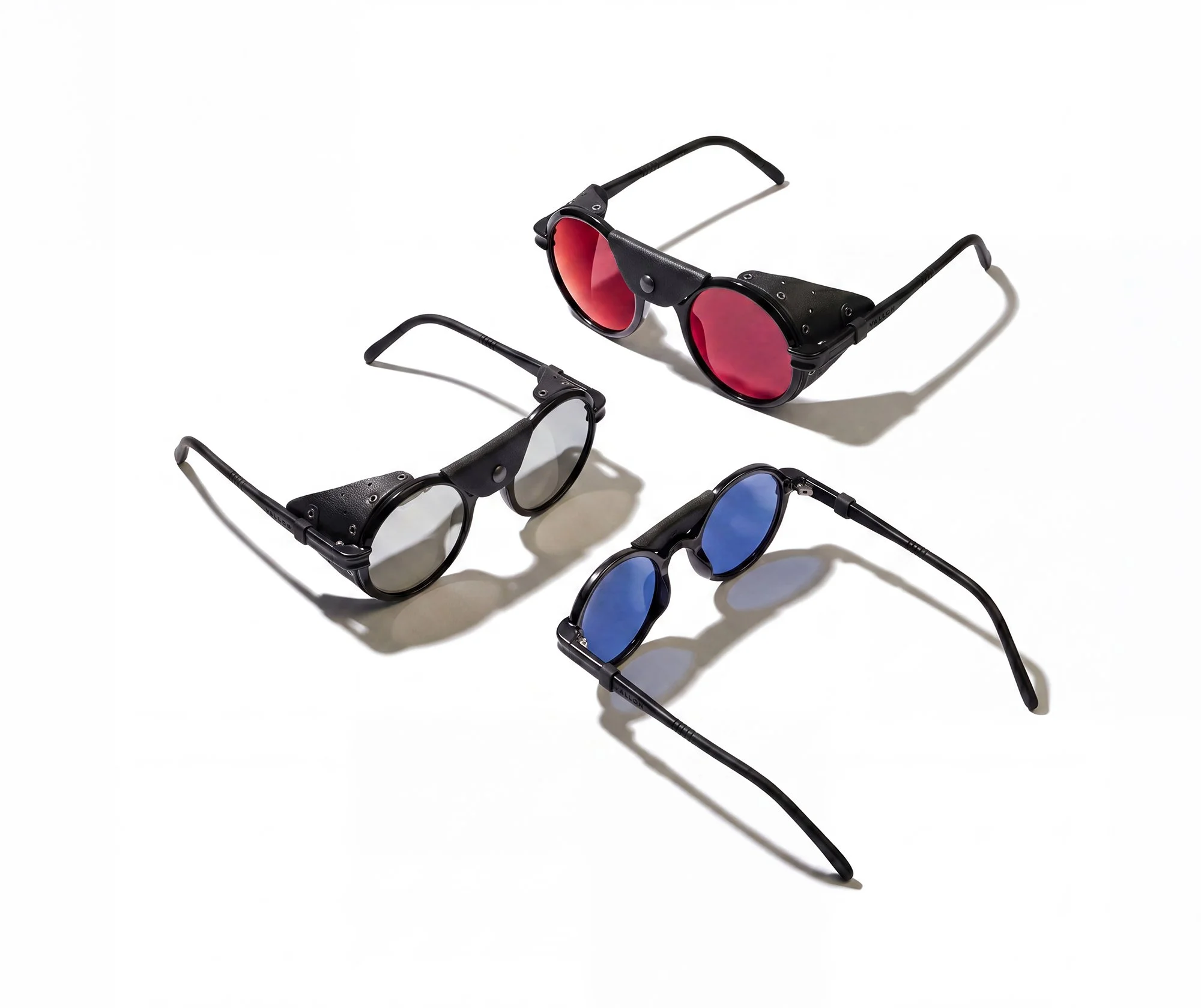 Coloured sunglasses on white background.