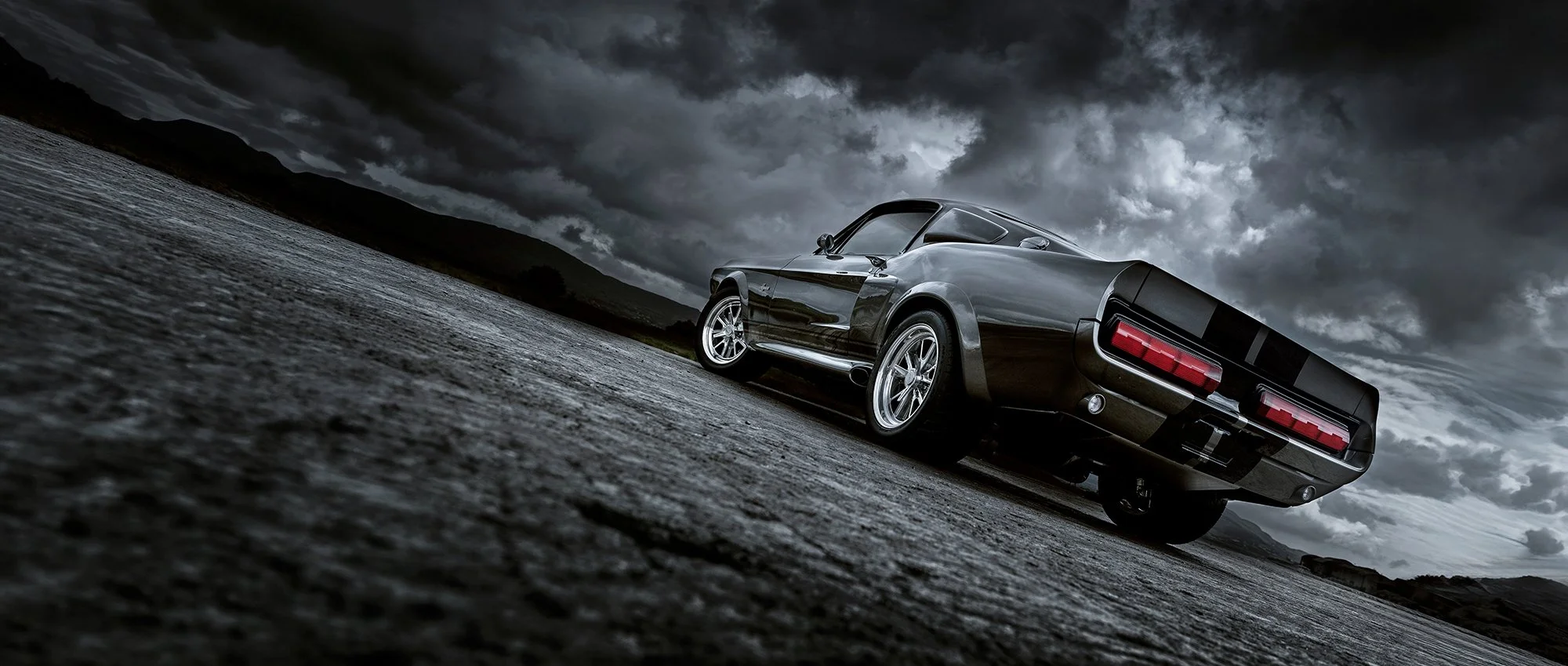 Shelby GT500 car against a moody dark sky