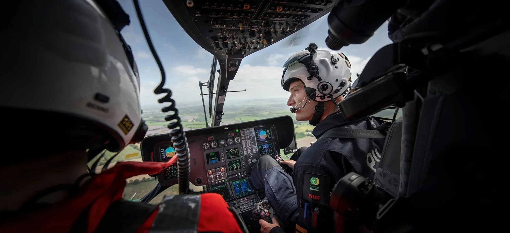 Helicopter pilot flying Air Ambulance Helicopter.