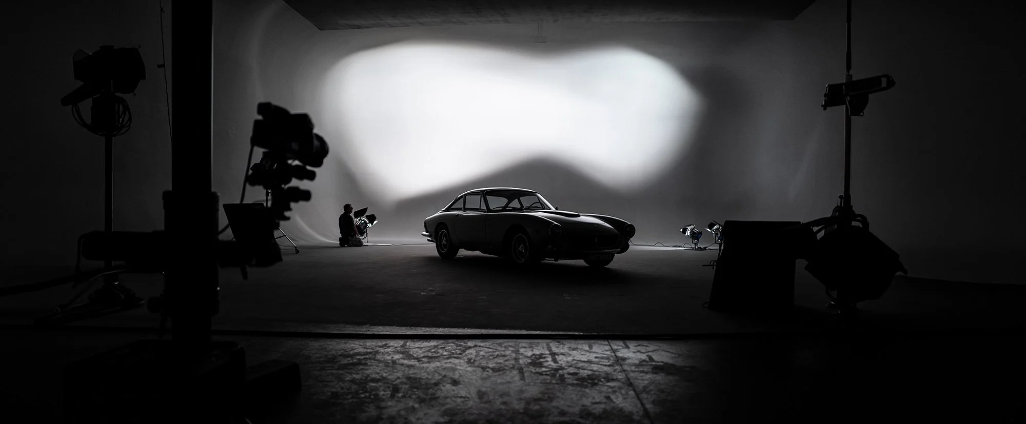 Silhouette of a car in a photographic studio
