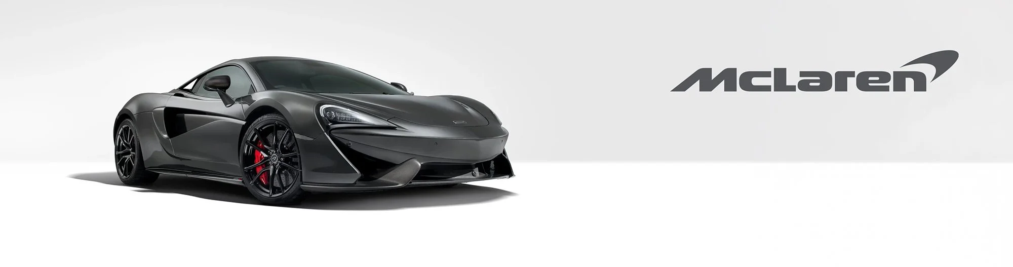 McLaren In white studio, car photography.