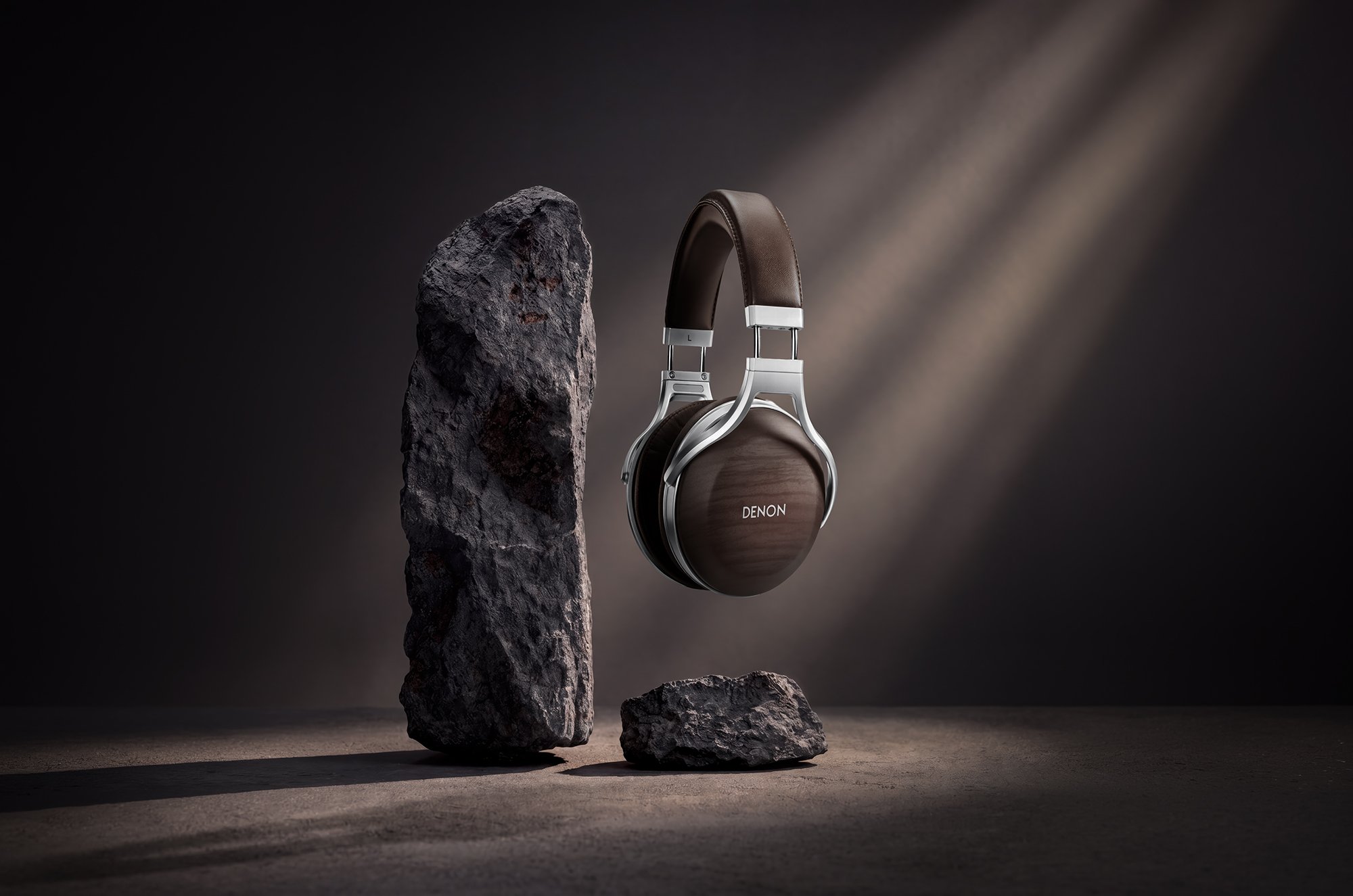 Headphones hanging above stone blocks