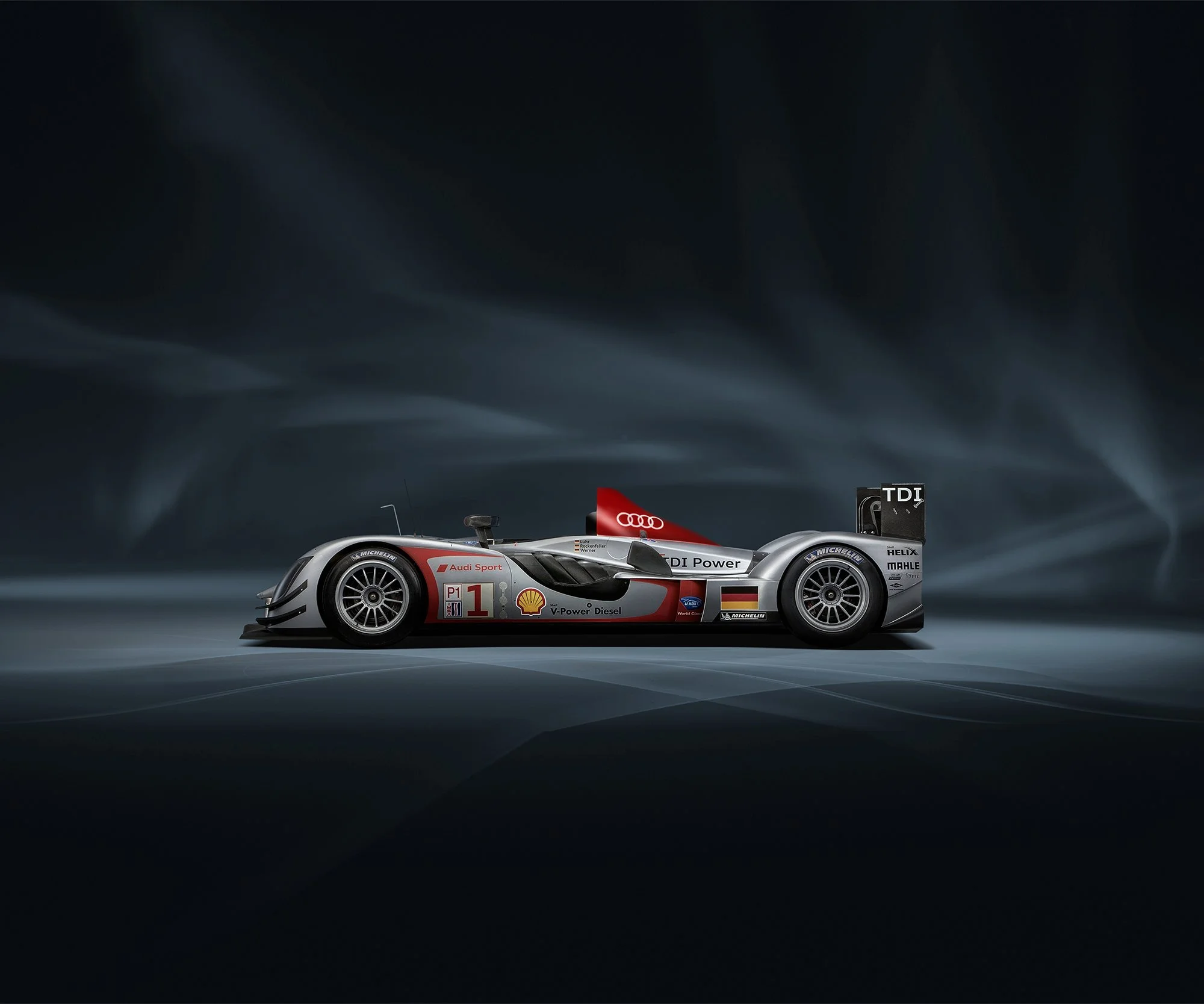 Audi race car in blue studio