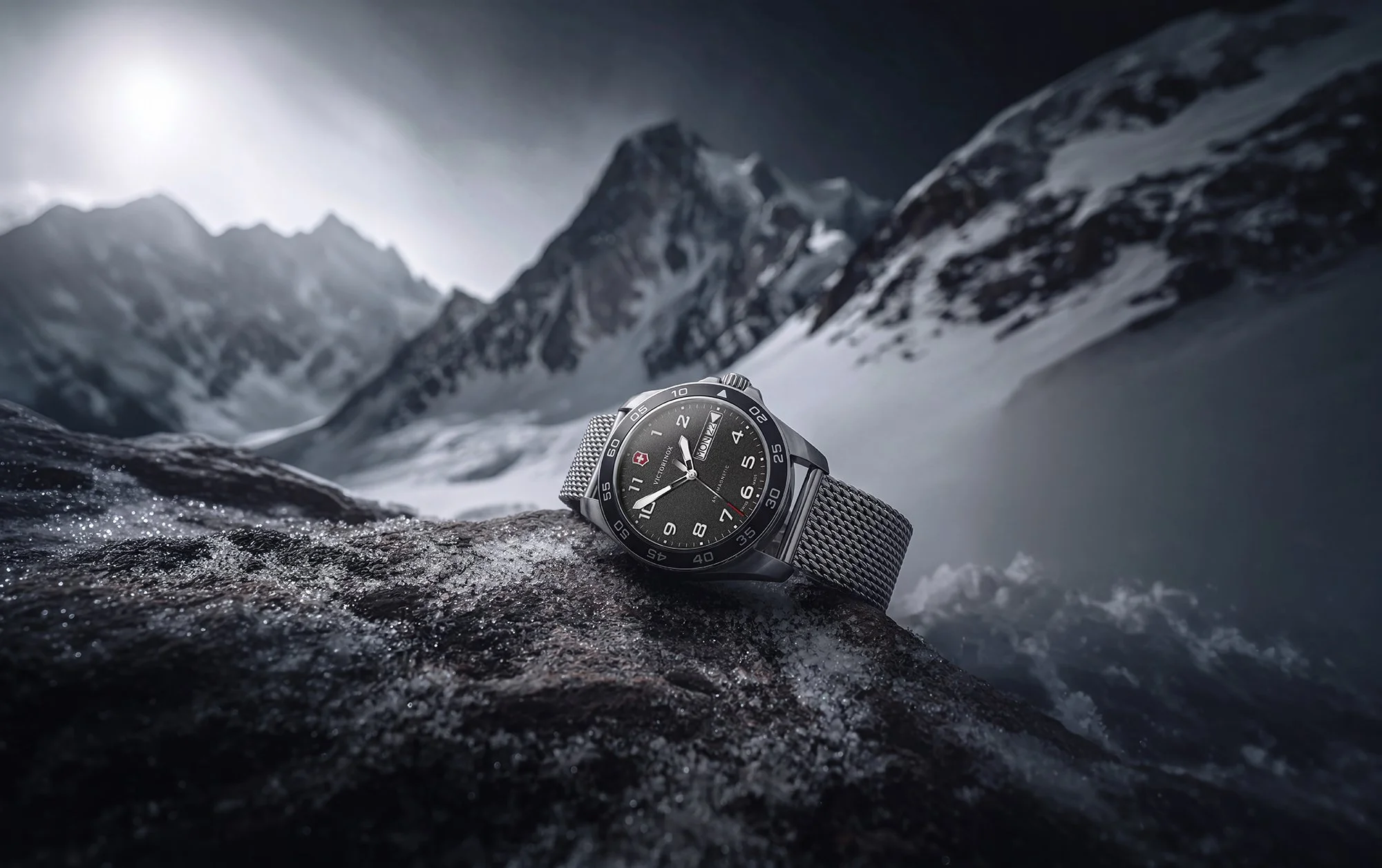 Watch on snowy mountain ridge