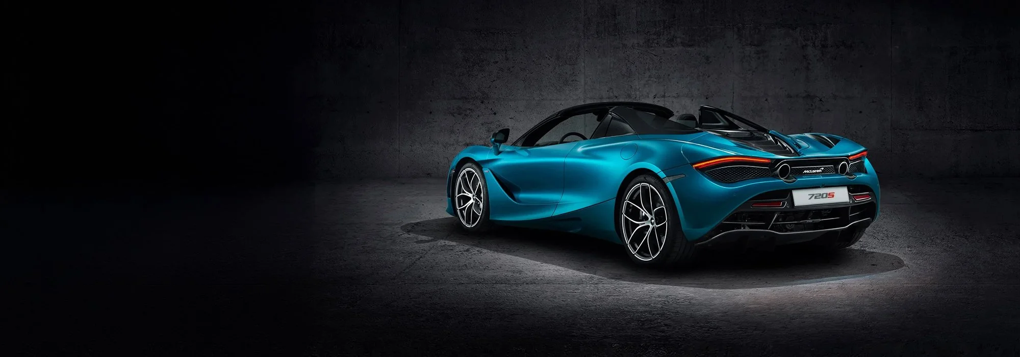 Blue McLaren 720s in studio, car photography