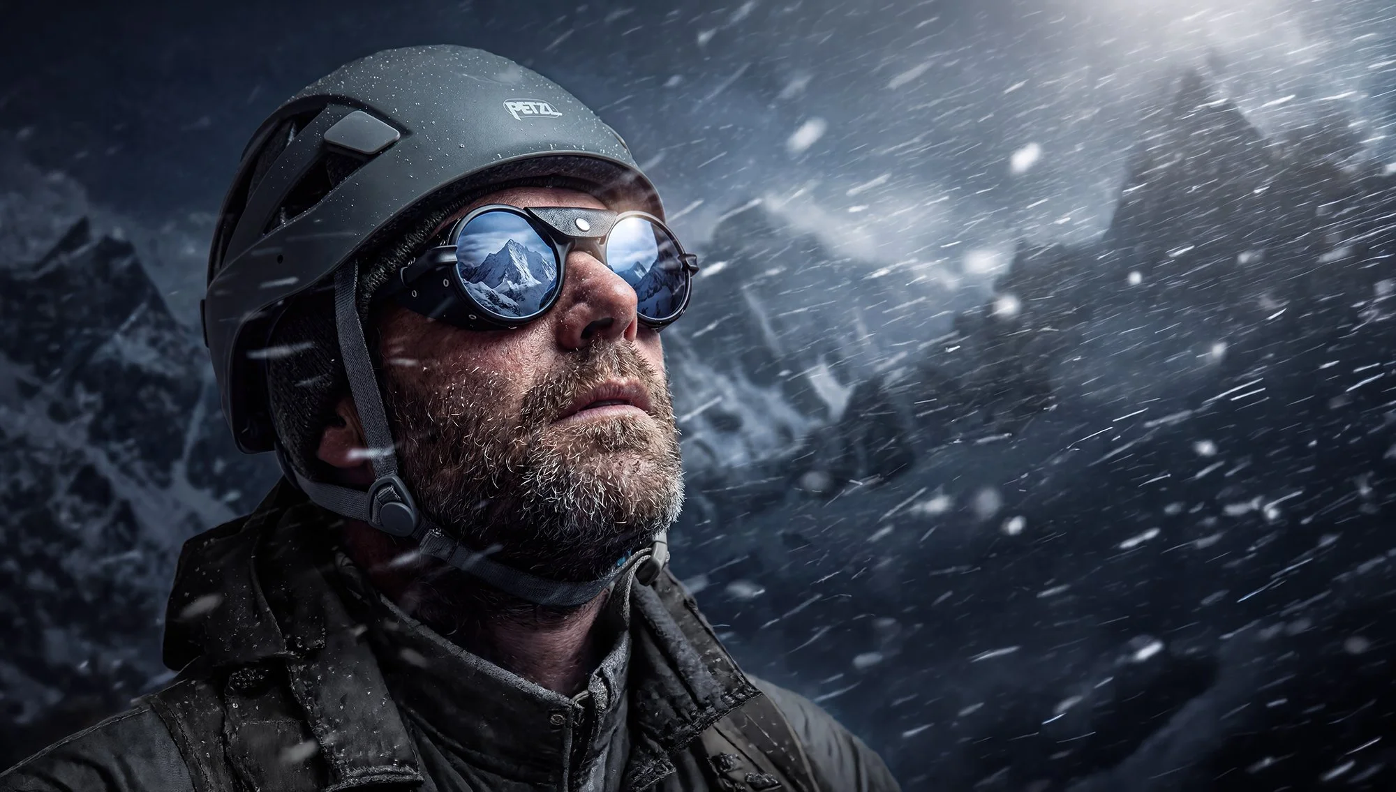 Climber wearing mirrored sun glasses