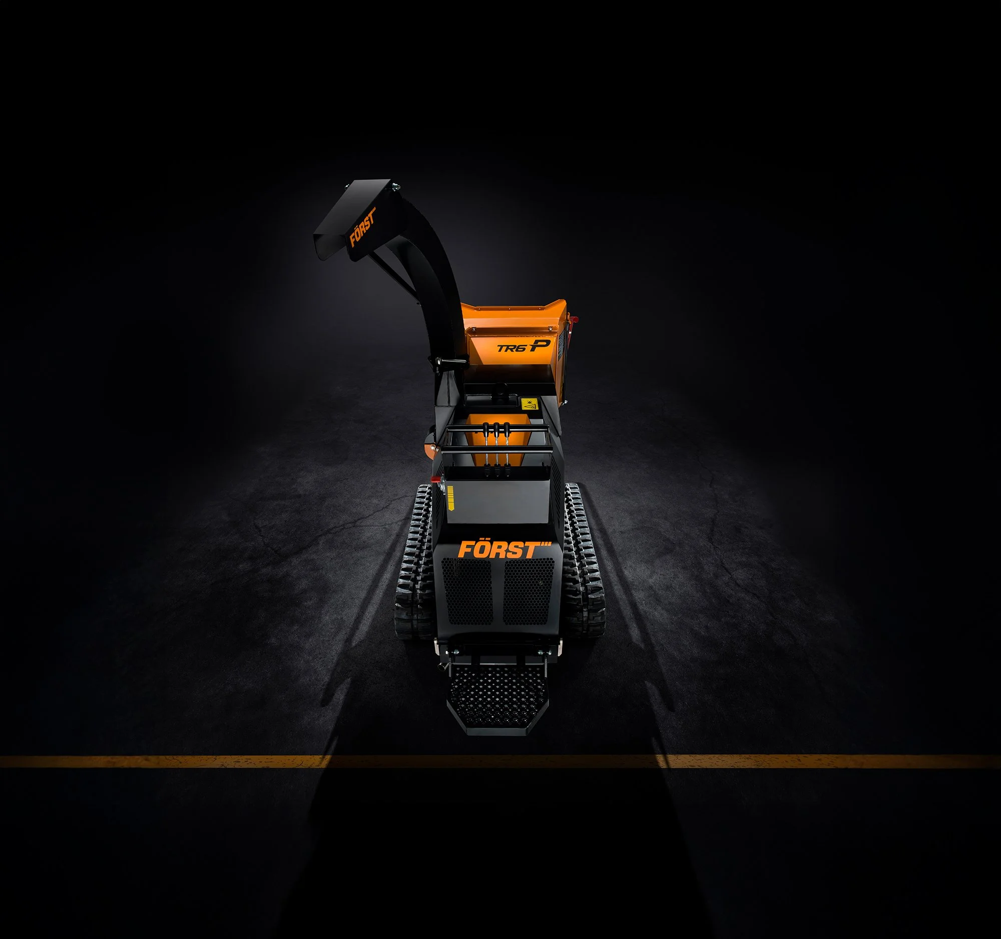 Dramatic image of a wood chipper from above, studio photography