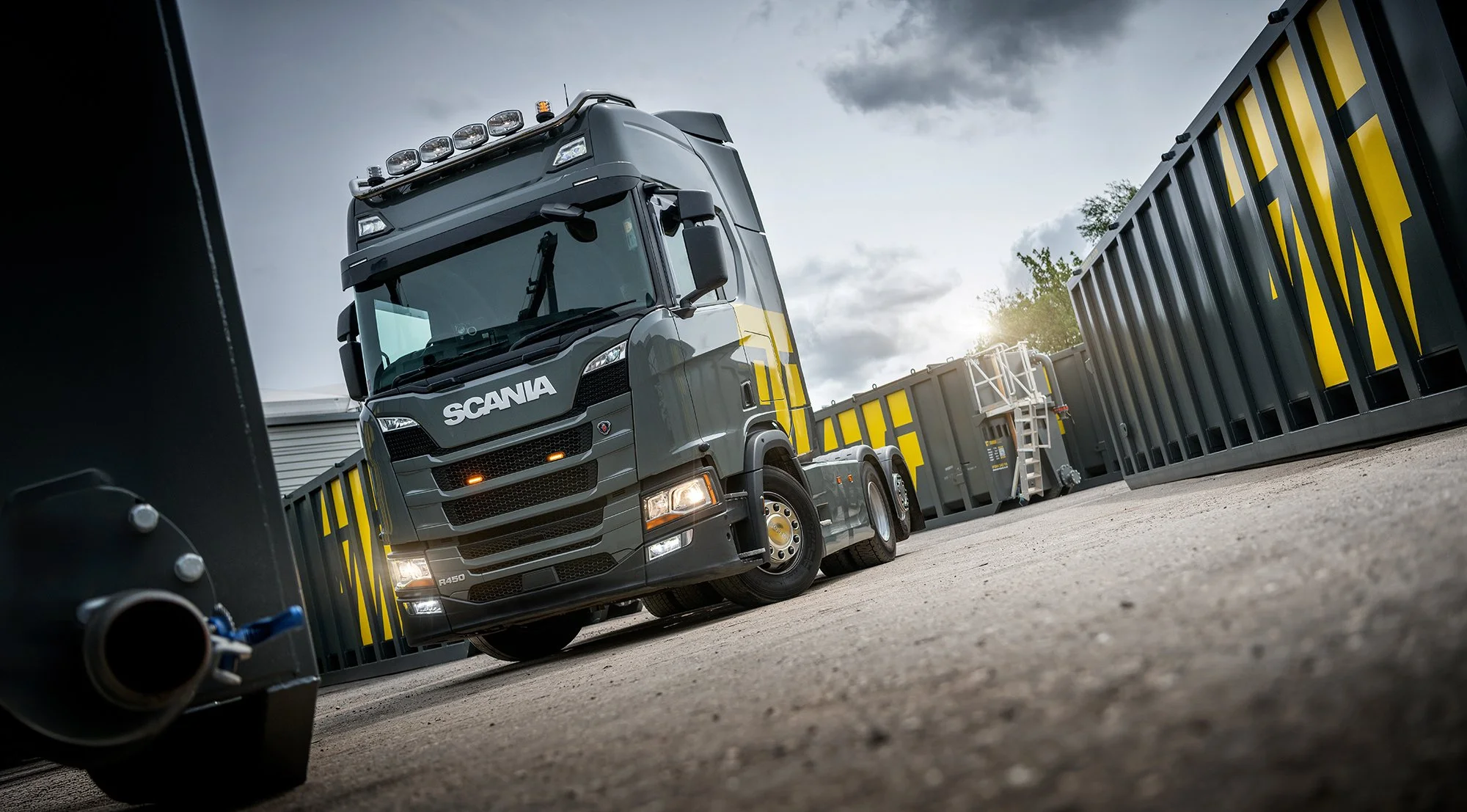 Scania truck in a depot yard.