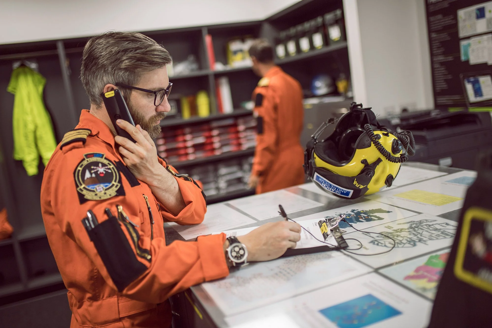 HM Coastguard Search and Rescue helicopter pilots in operations room