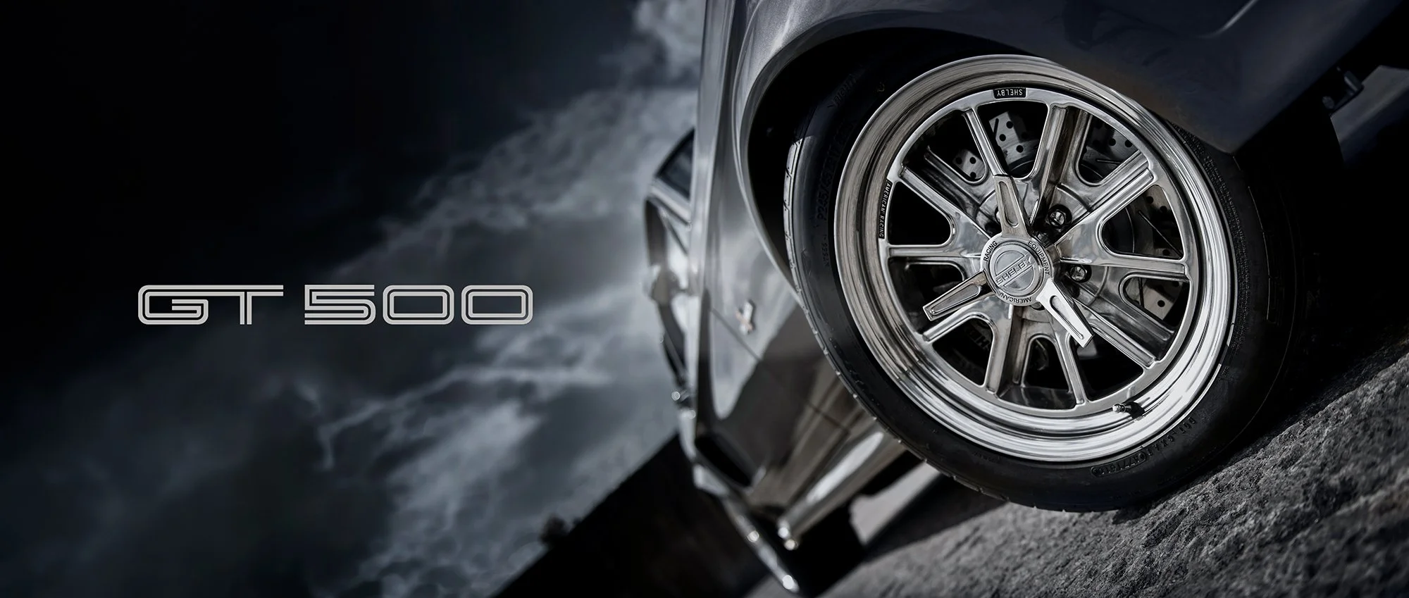 Shelby GT500 car against a moody dark sky