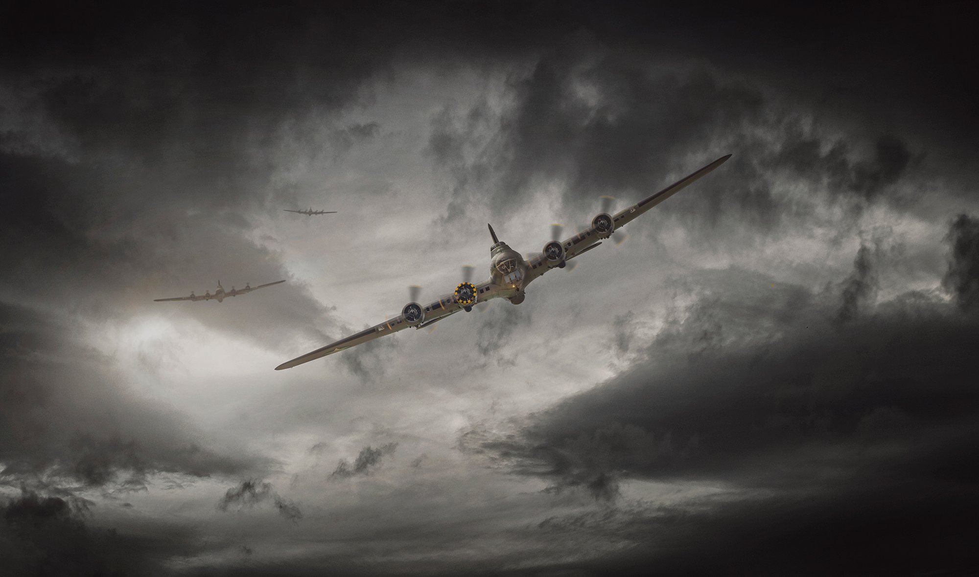 B17 bomber flying through cloudy skies