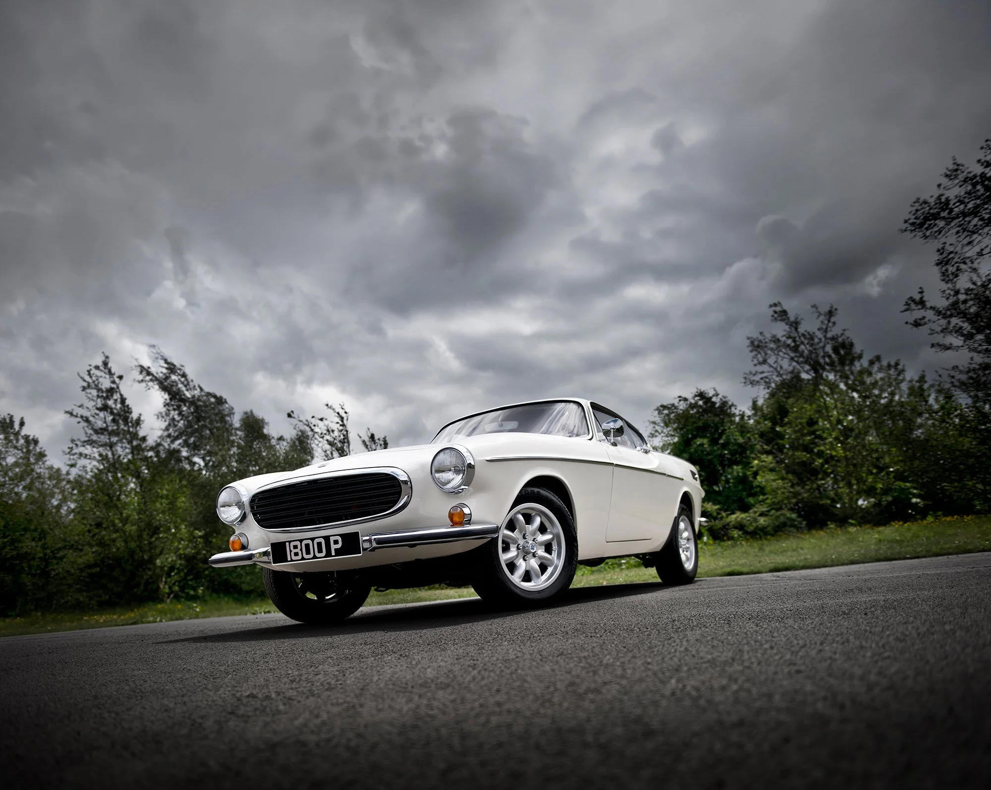 Vintage Volvo P1800 in cream colour.