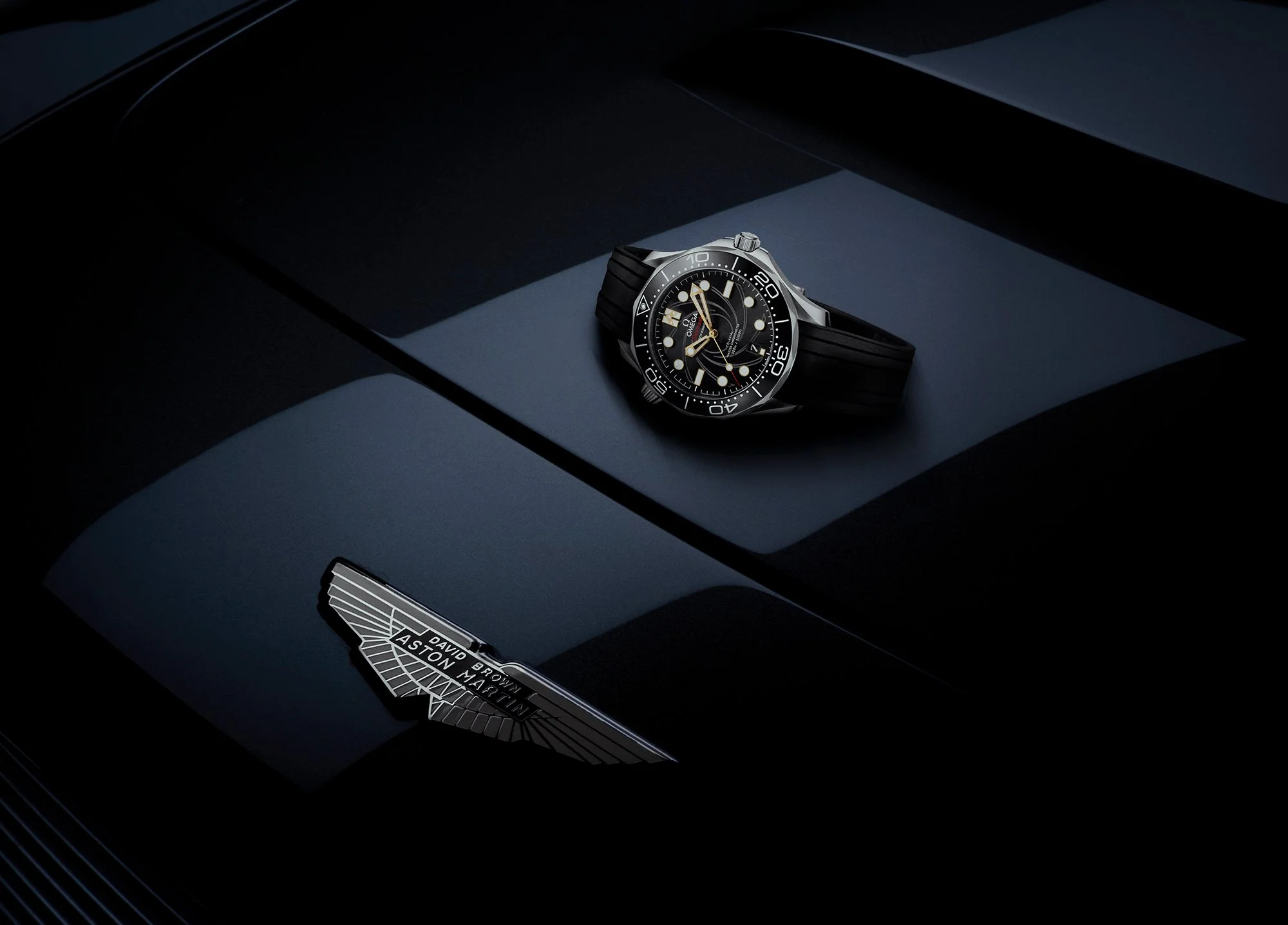 James Bond watch on bonnet of Aston Martin.