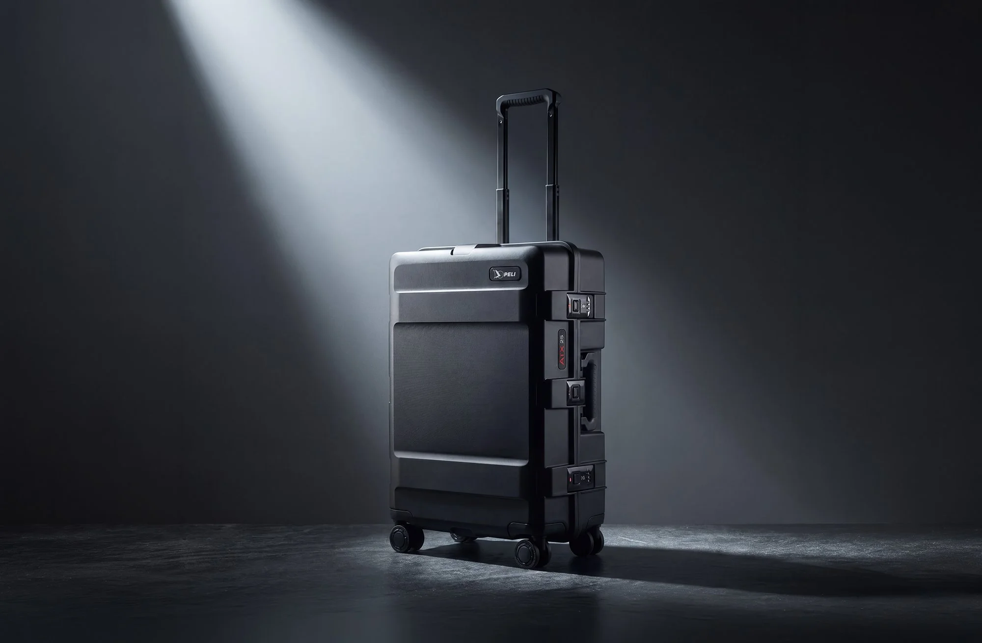 Suitcase in dark background with shaft of light