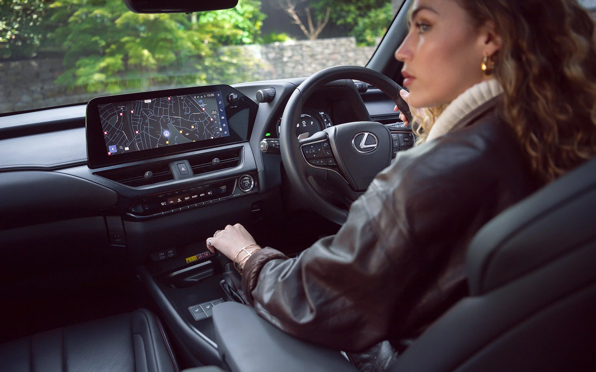 Woman sat in Lexus car, car photography