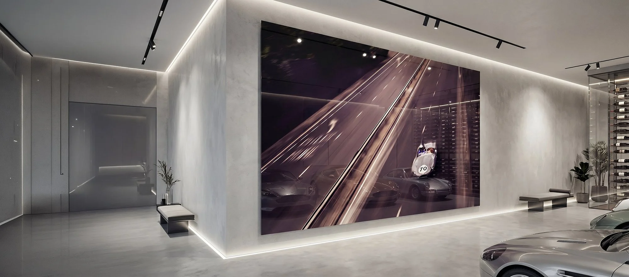 Giant car image print on studio wall.