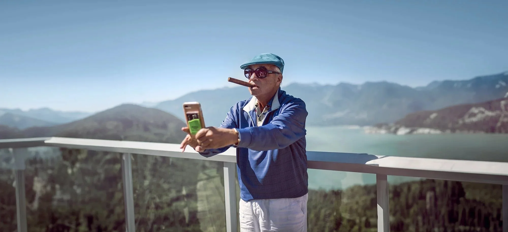 Elderly man taking a selfie