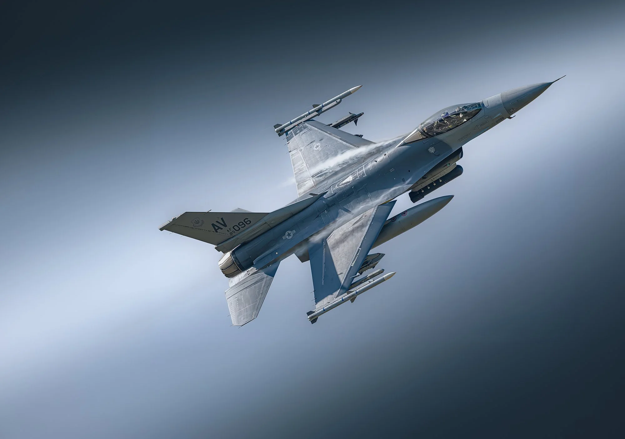Fighter aircraft in flight