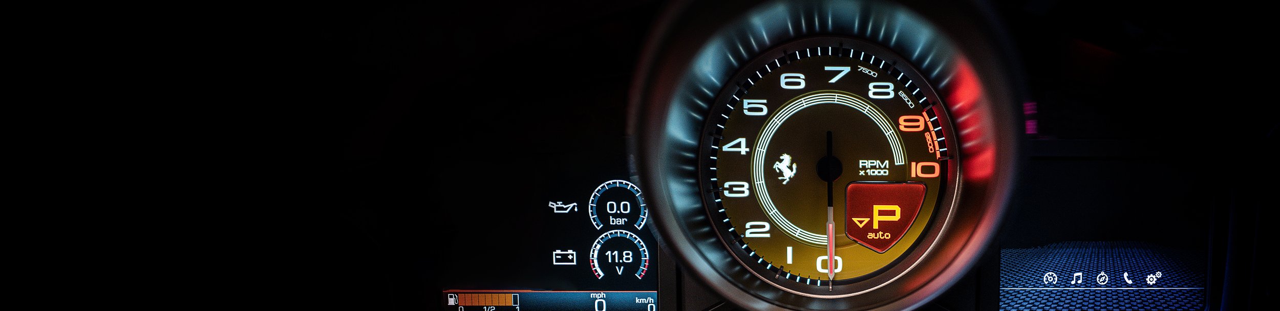 Illuminated Ferrari rev counter dial.